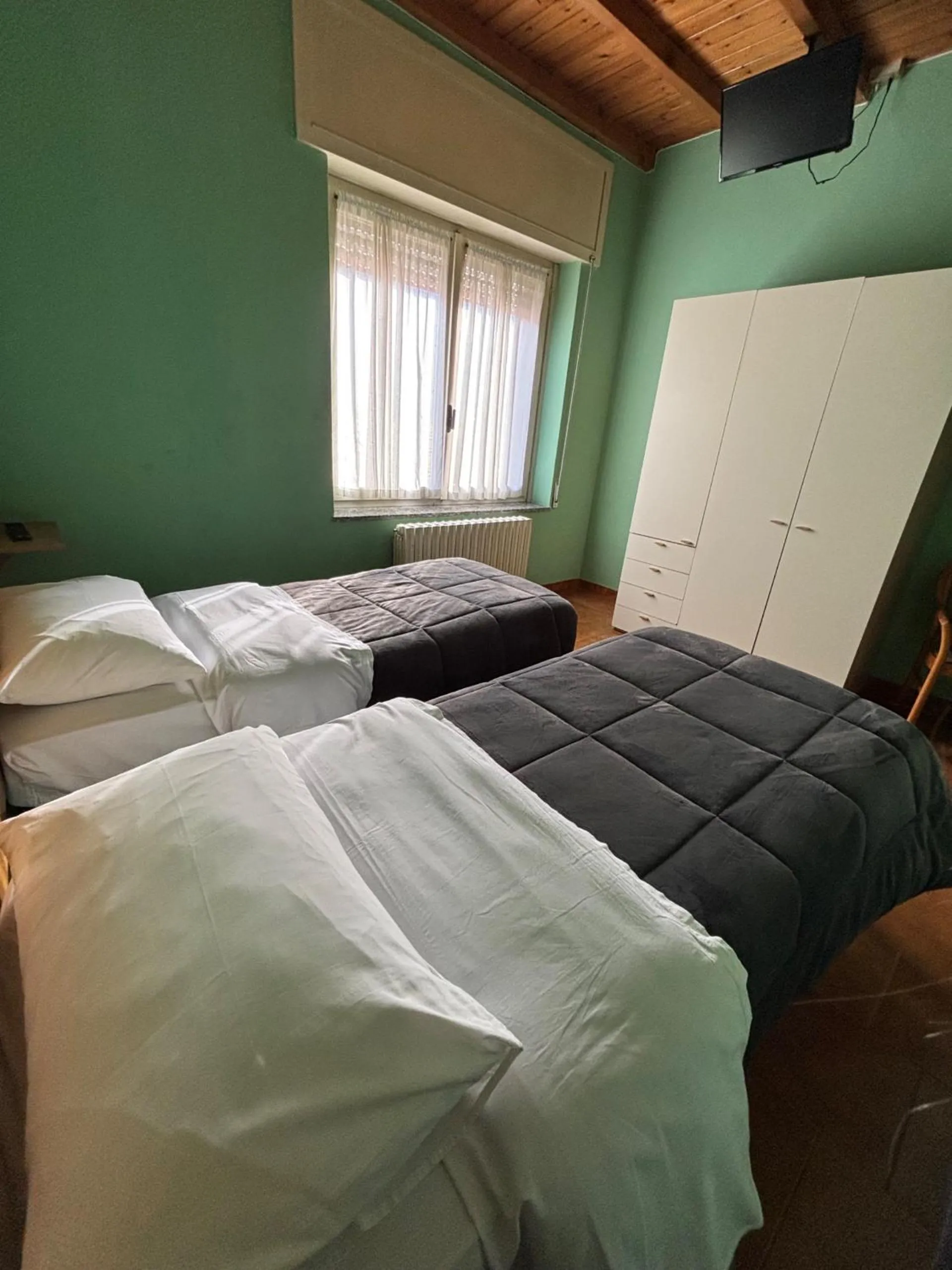 Bed in Albergo Baffo