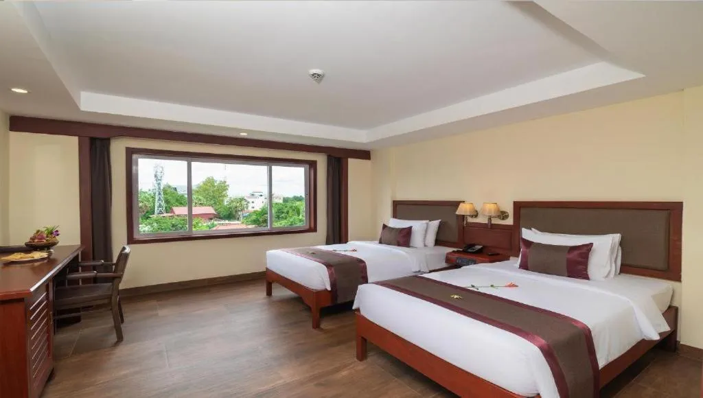 Bed in Hotel De La Renaissance