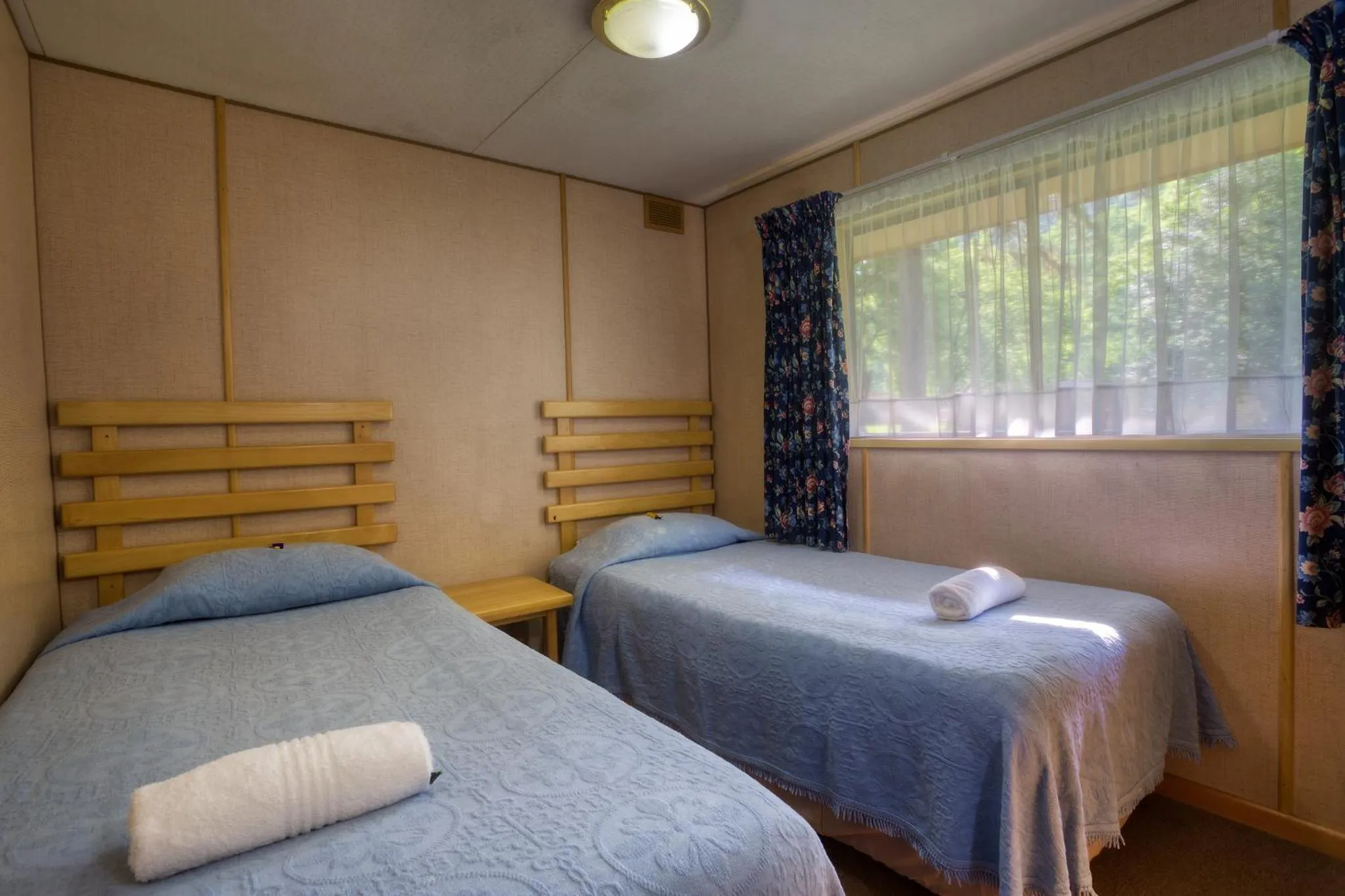 Bed in Merry Pebbles Resort