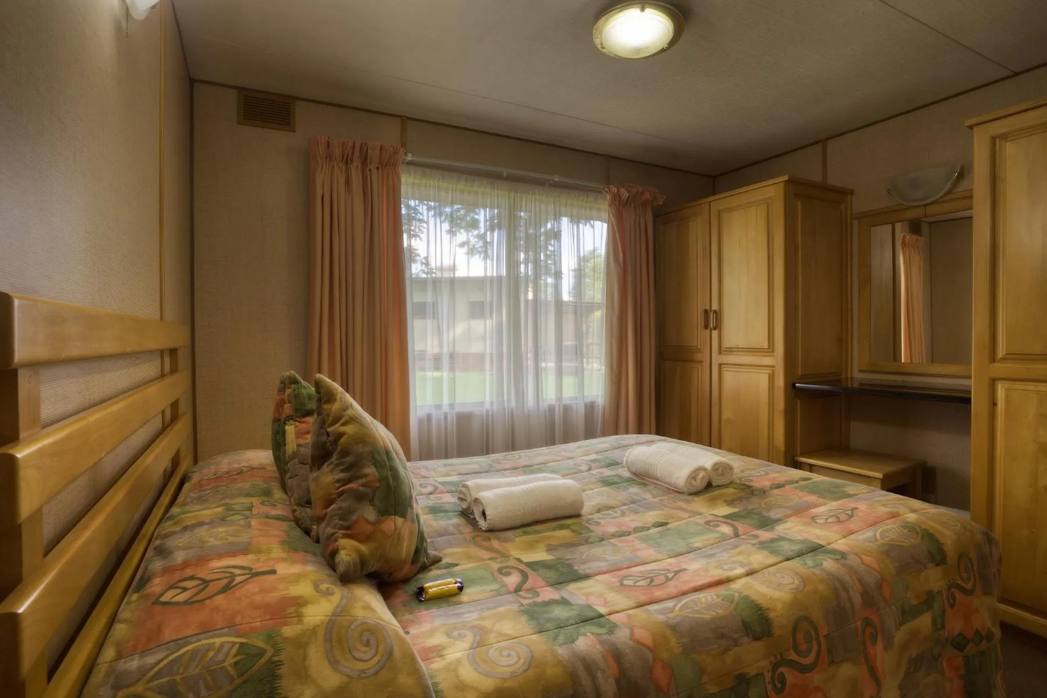 Bed in Merry Pebbles Resort