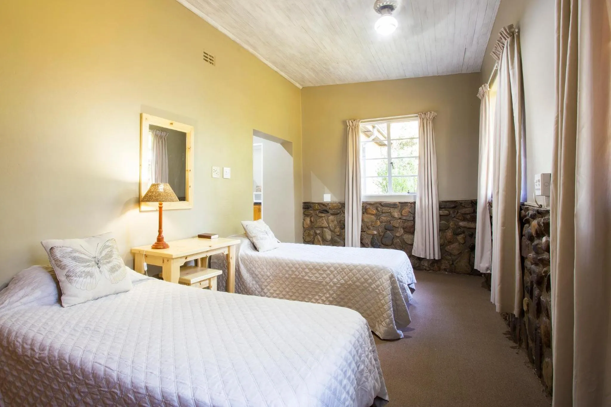 Bed in Merry Pebbles Resort