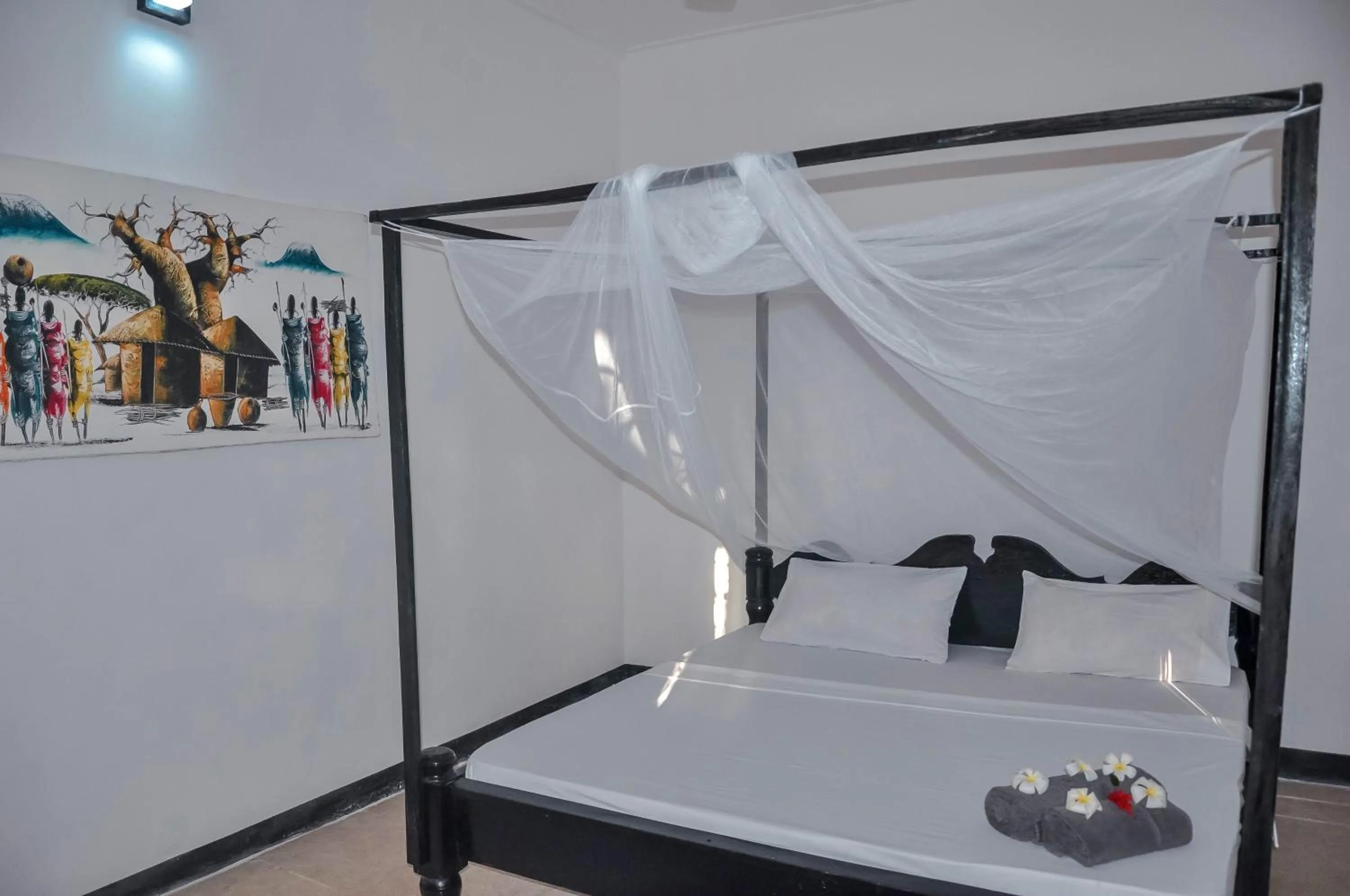 Bed in Papaya Guest House Nungwi