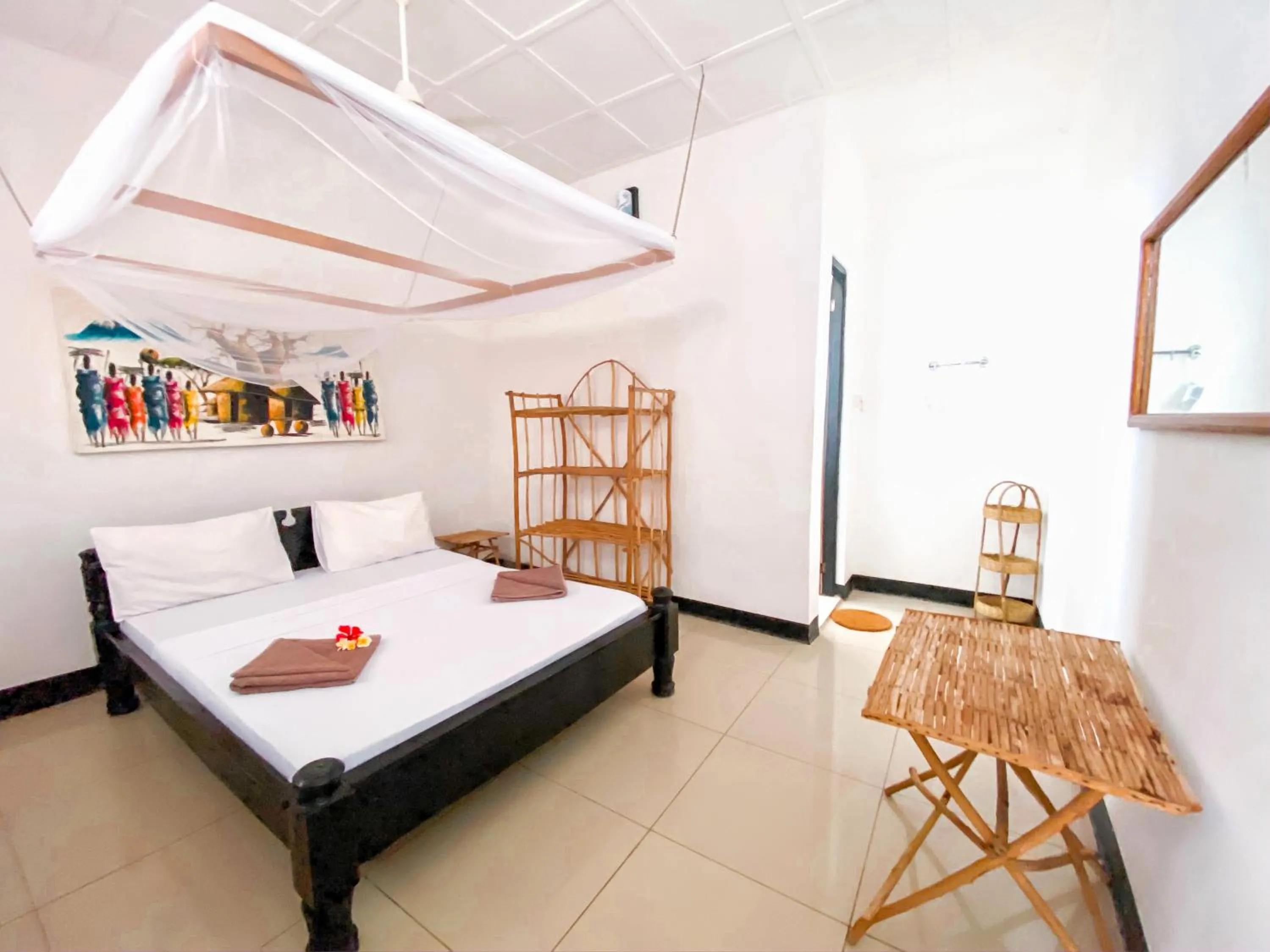 Photo of the whole room, Bed in Papaya Guest House Nungwi