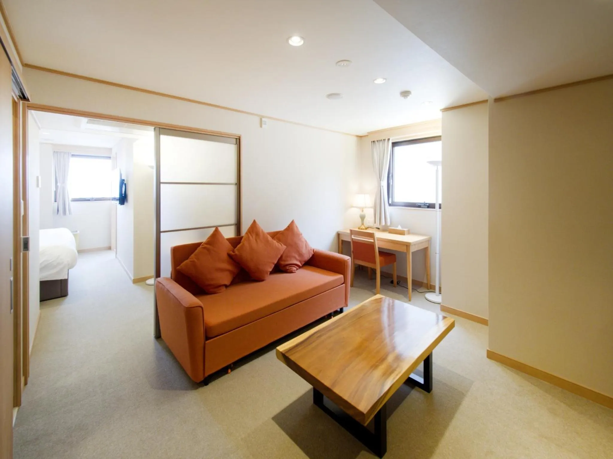 Living room, Bed in T Hotel Ryuoo
