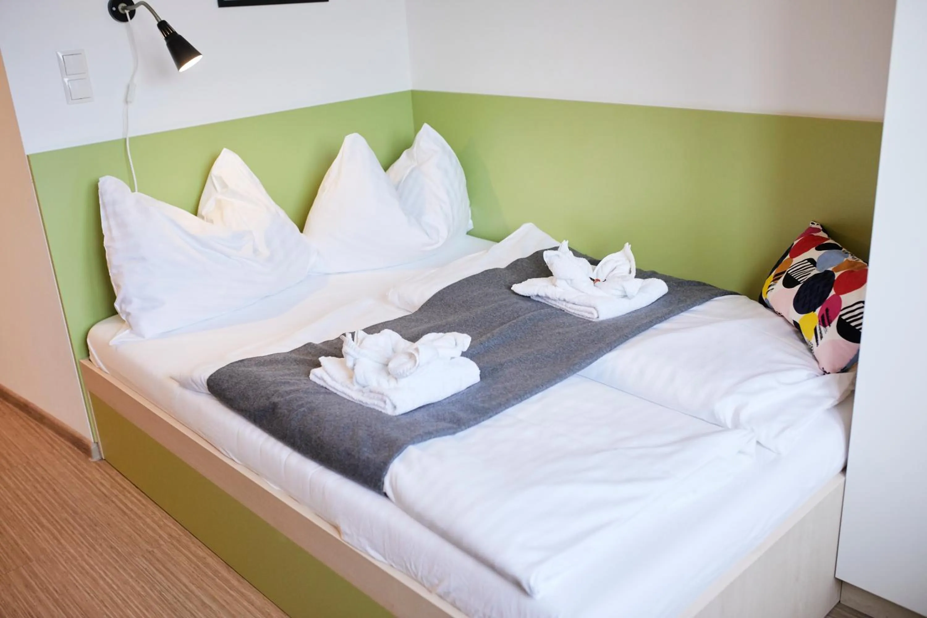 Bed in I AM HOTEL Leoben