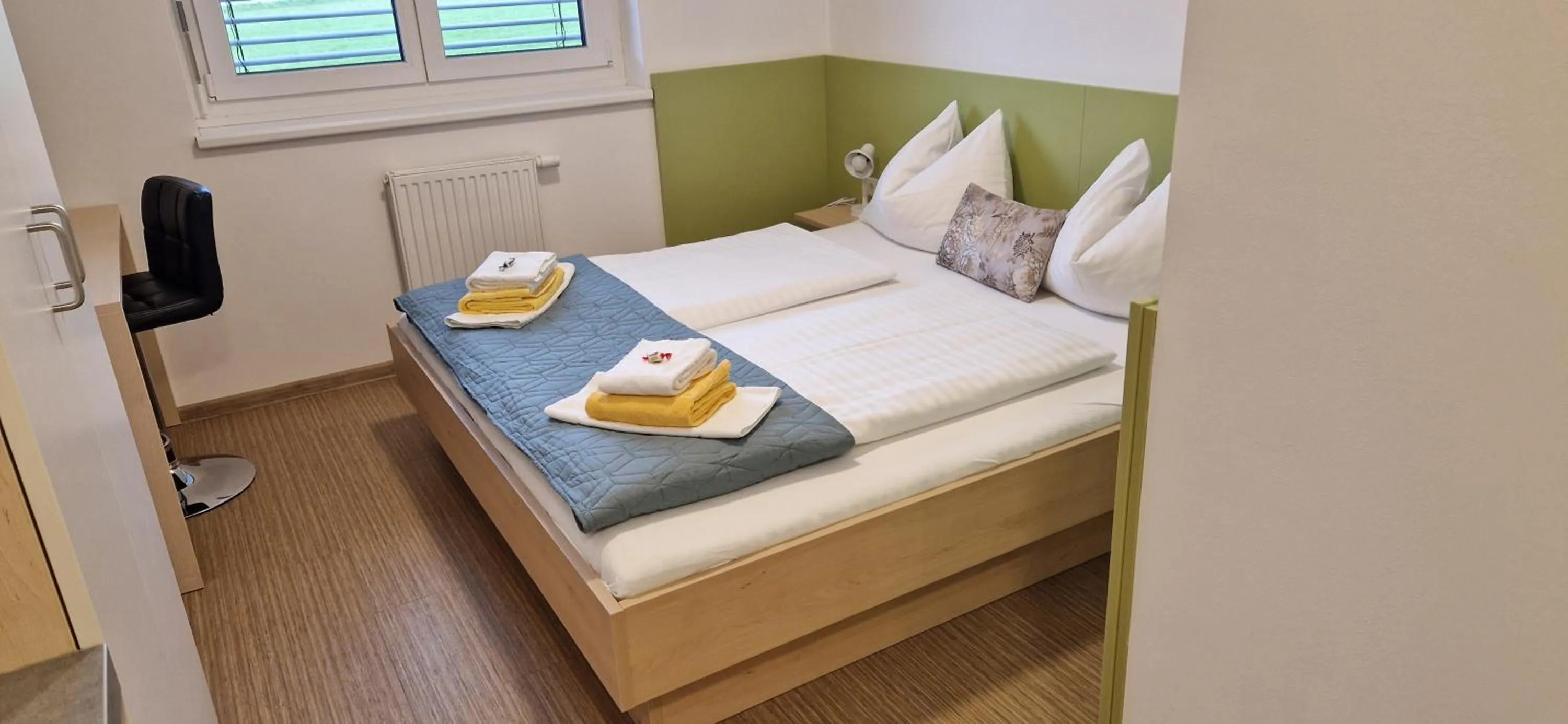 Photo of the whole room, Bed in I AM HOTEL Leoben