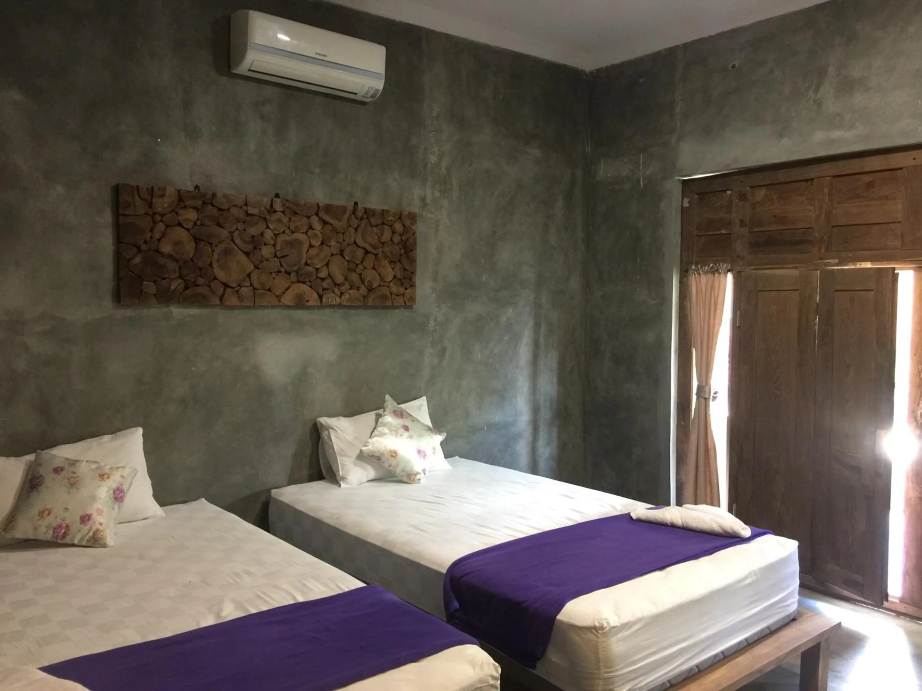 Bed in Watukarung Ristu Homestay