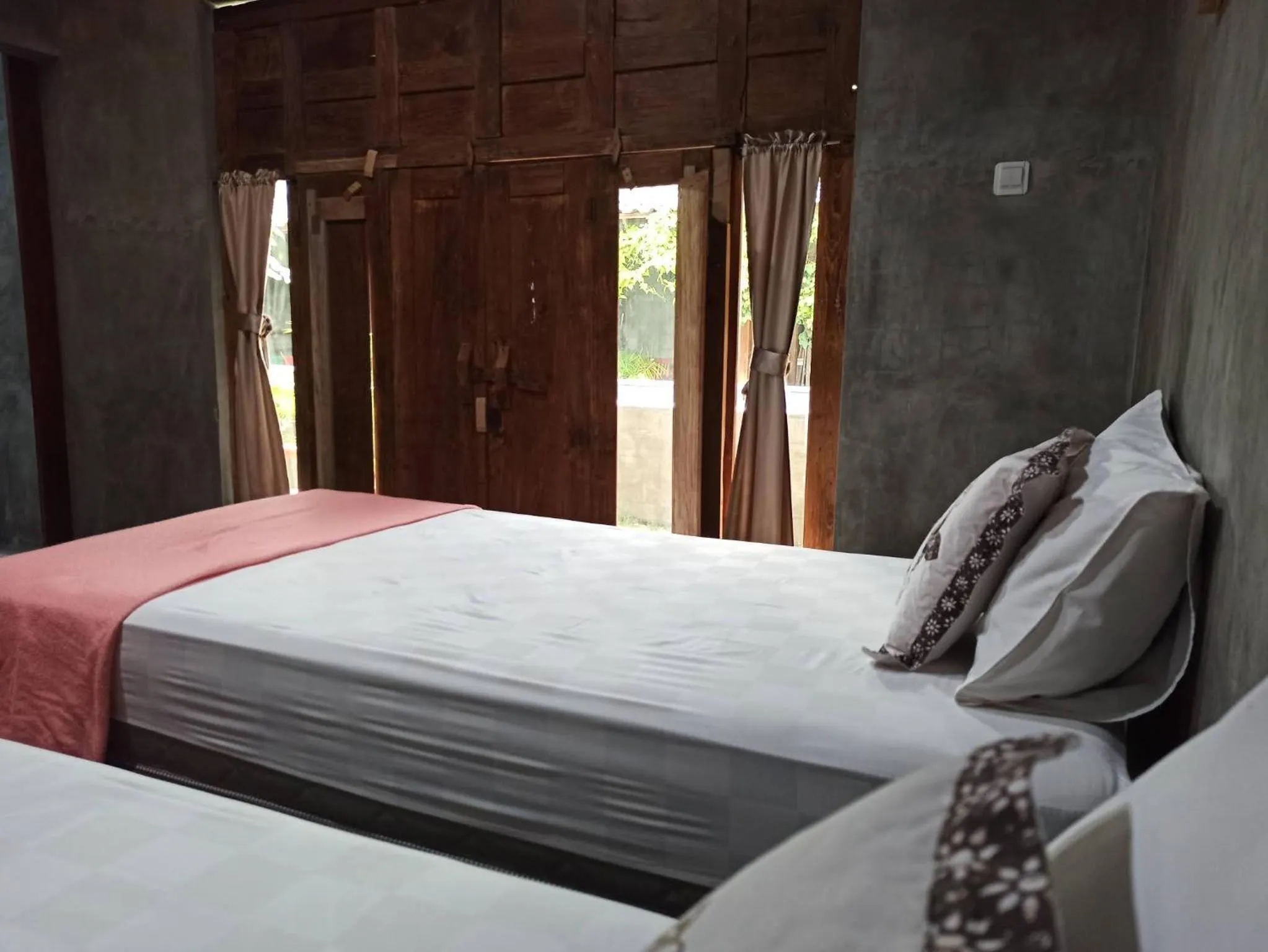 Bed in Watukarung Ristu Homestay