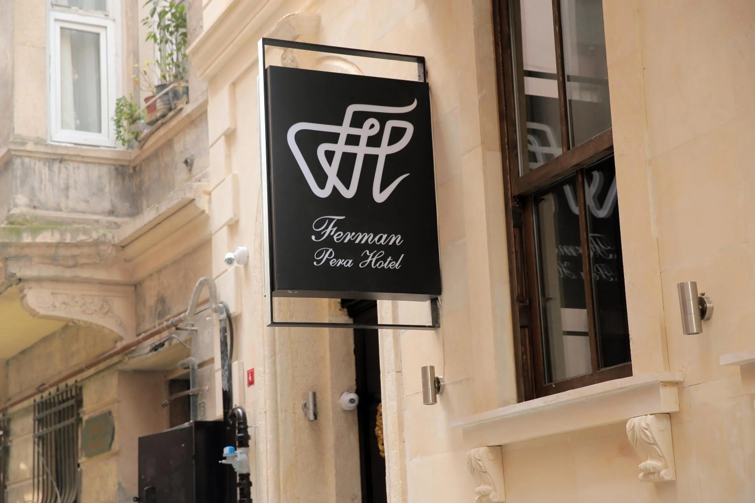 Property logo or sign in Ferman Pera Hotel