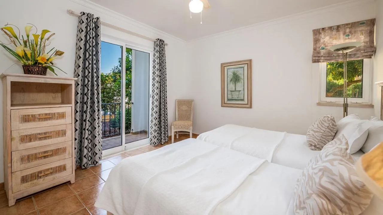 Bed in Jardim da Meia Praia Resort