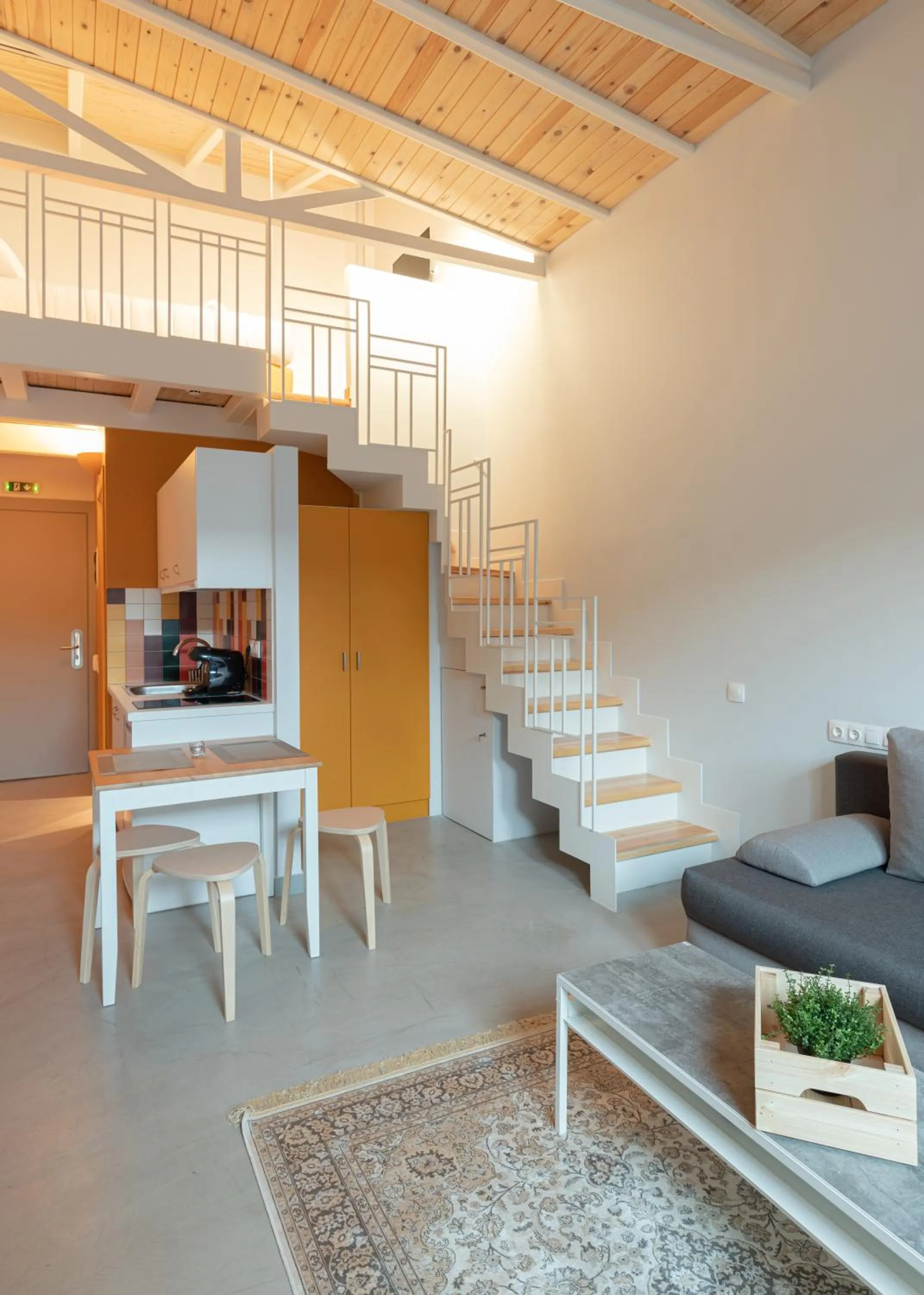 Seating area in Ether Loft Suites