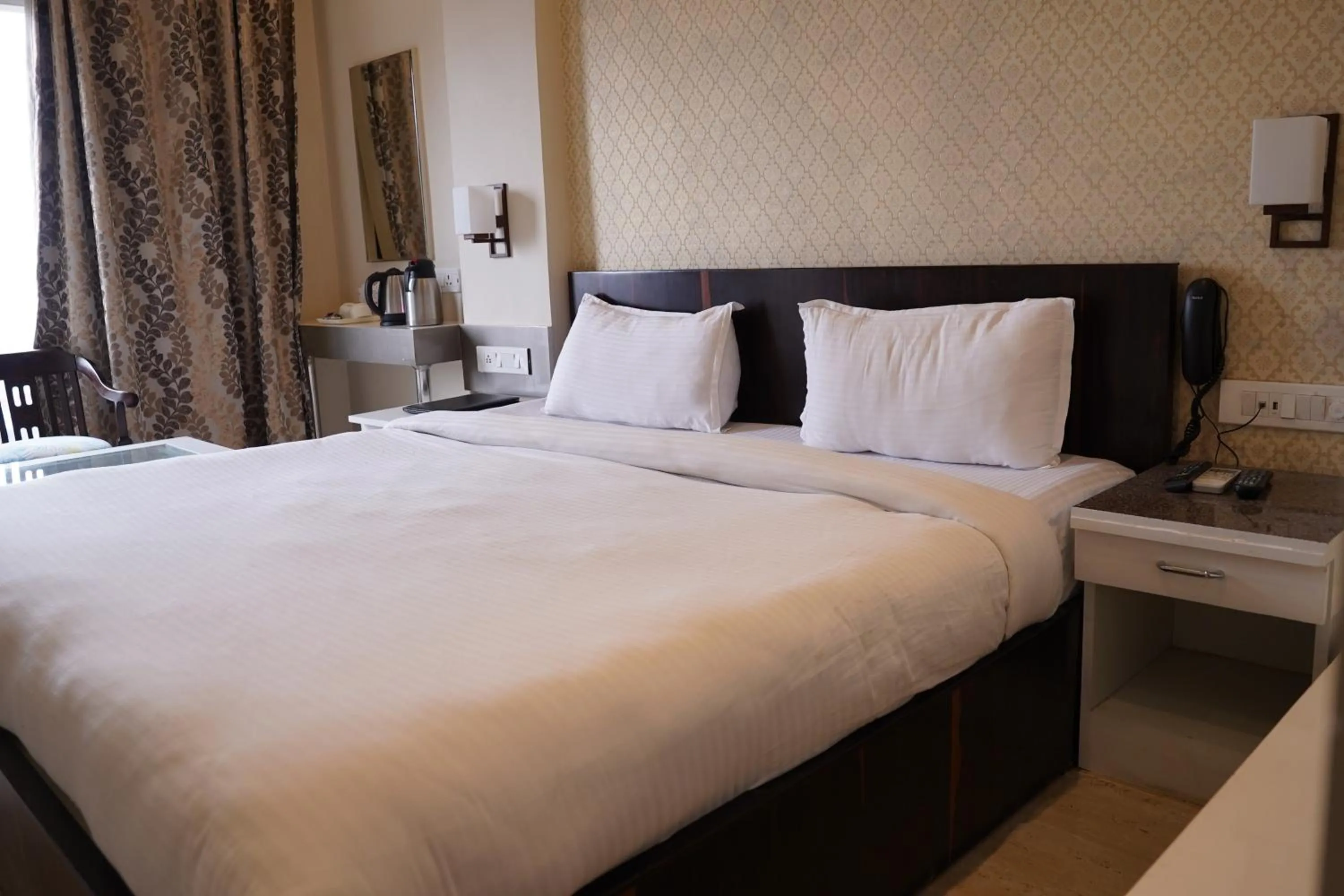 Bed in Hotel Varanasi Heritage