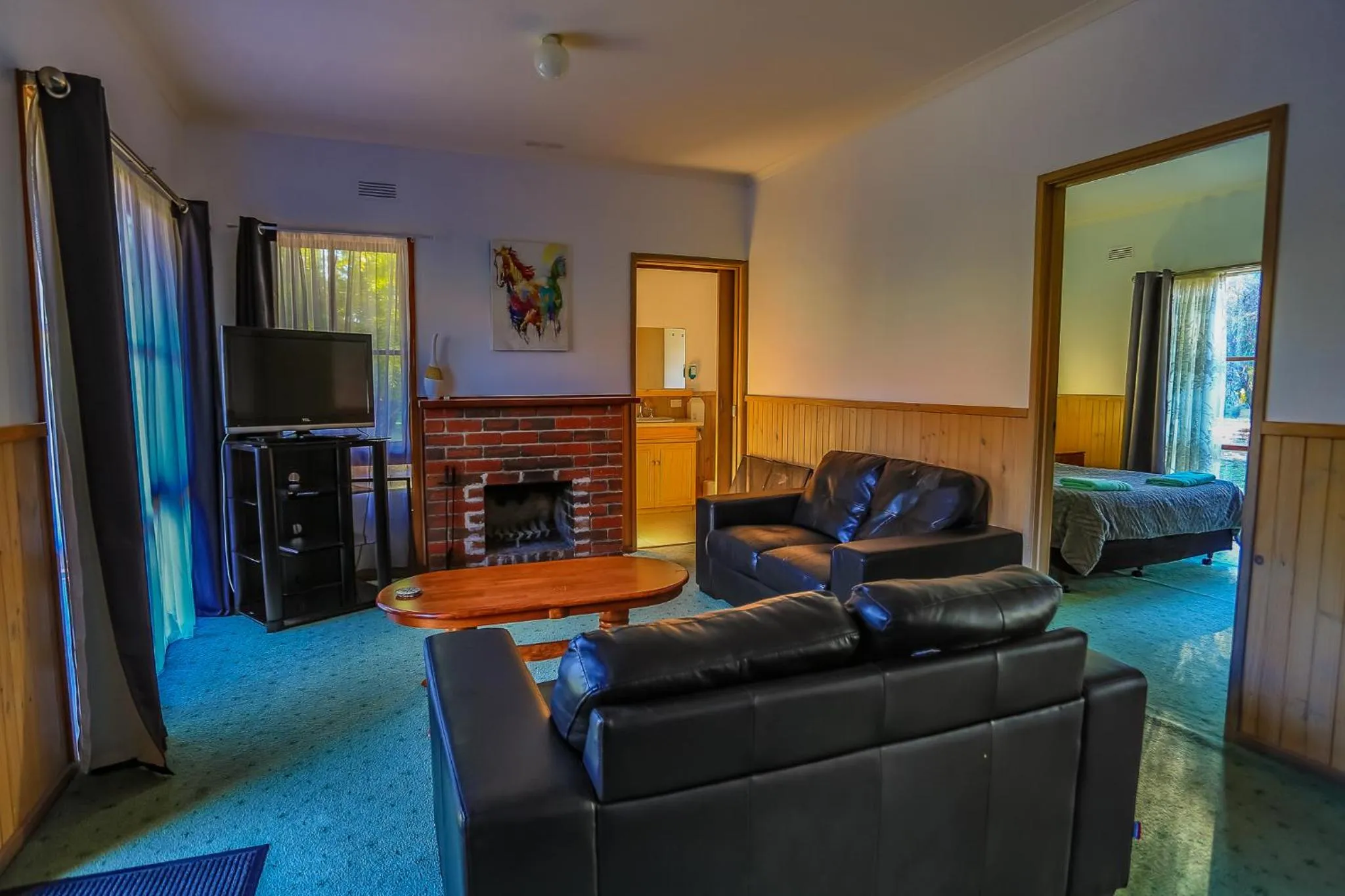 Living room in Mountain View Motor Inn & Holiday Lodges