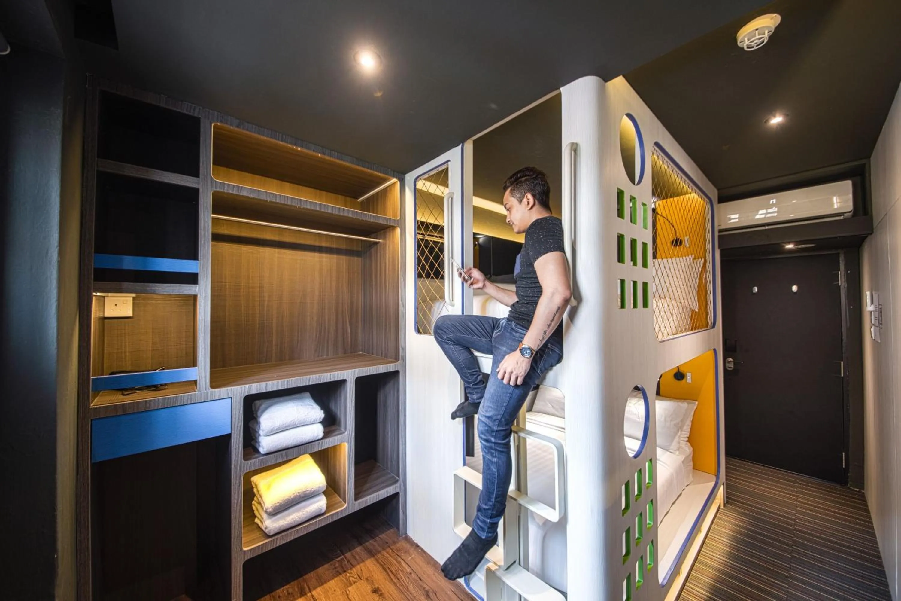 People in CUBE Family Boutique Capsule Hotel at Chinatown