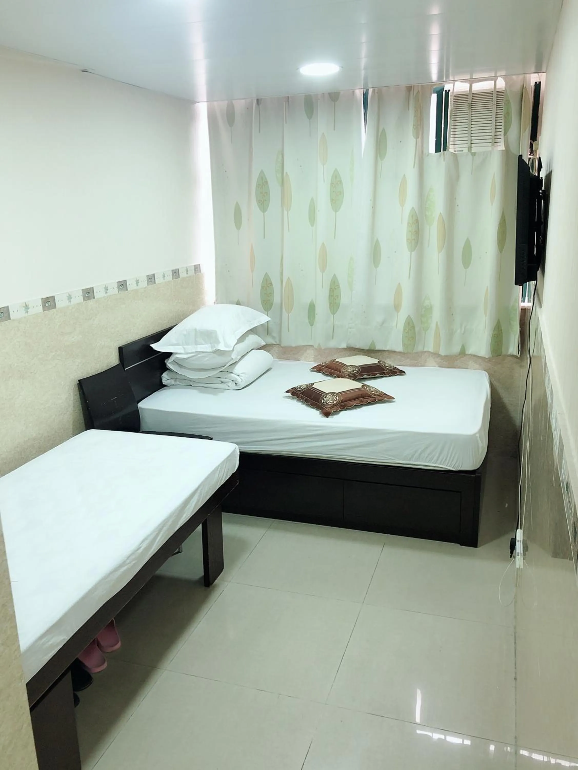 Bed in Hung Fai Guest House