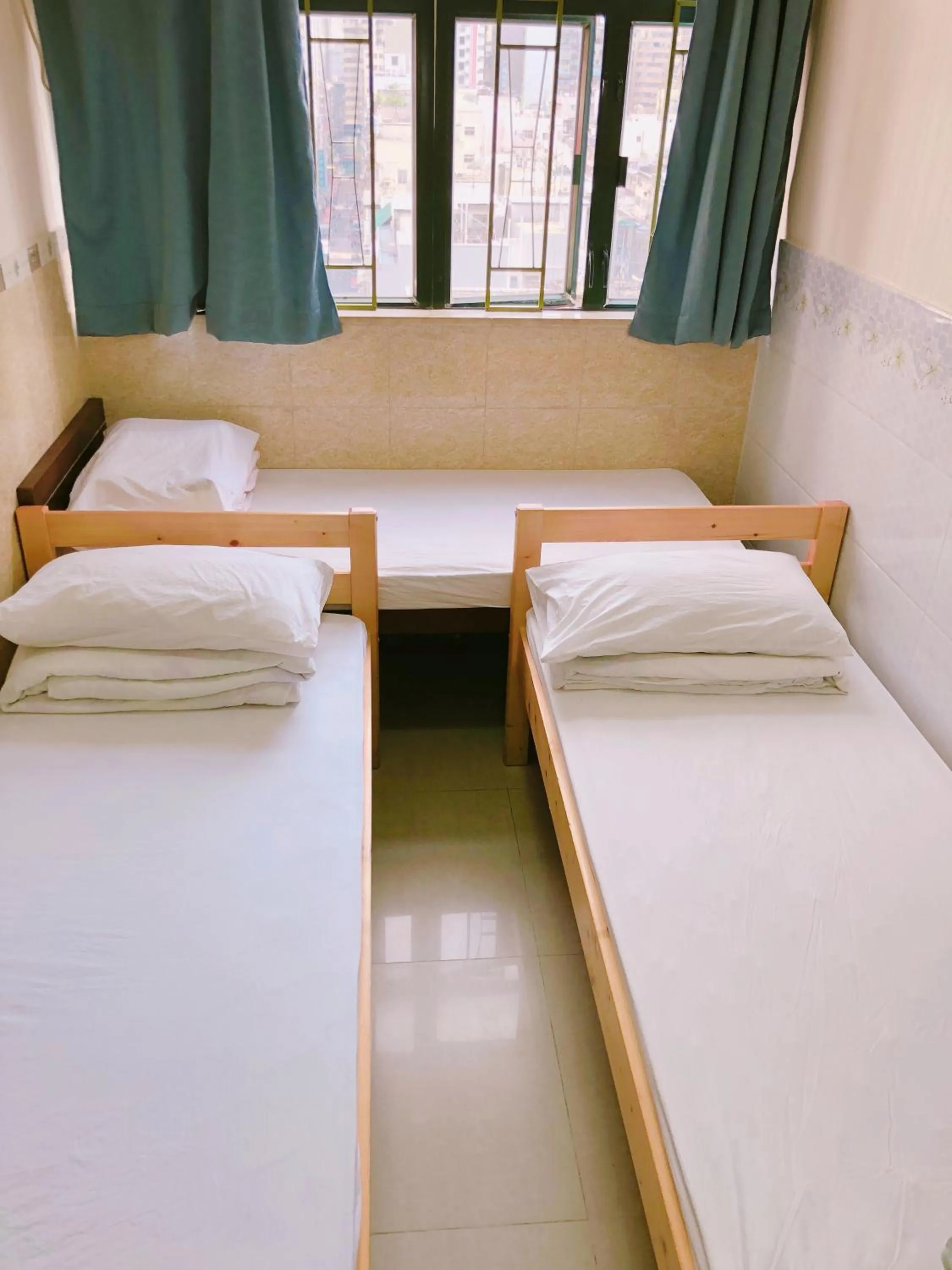 Bed in Hung Fai Guest House