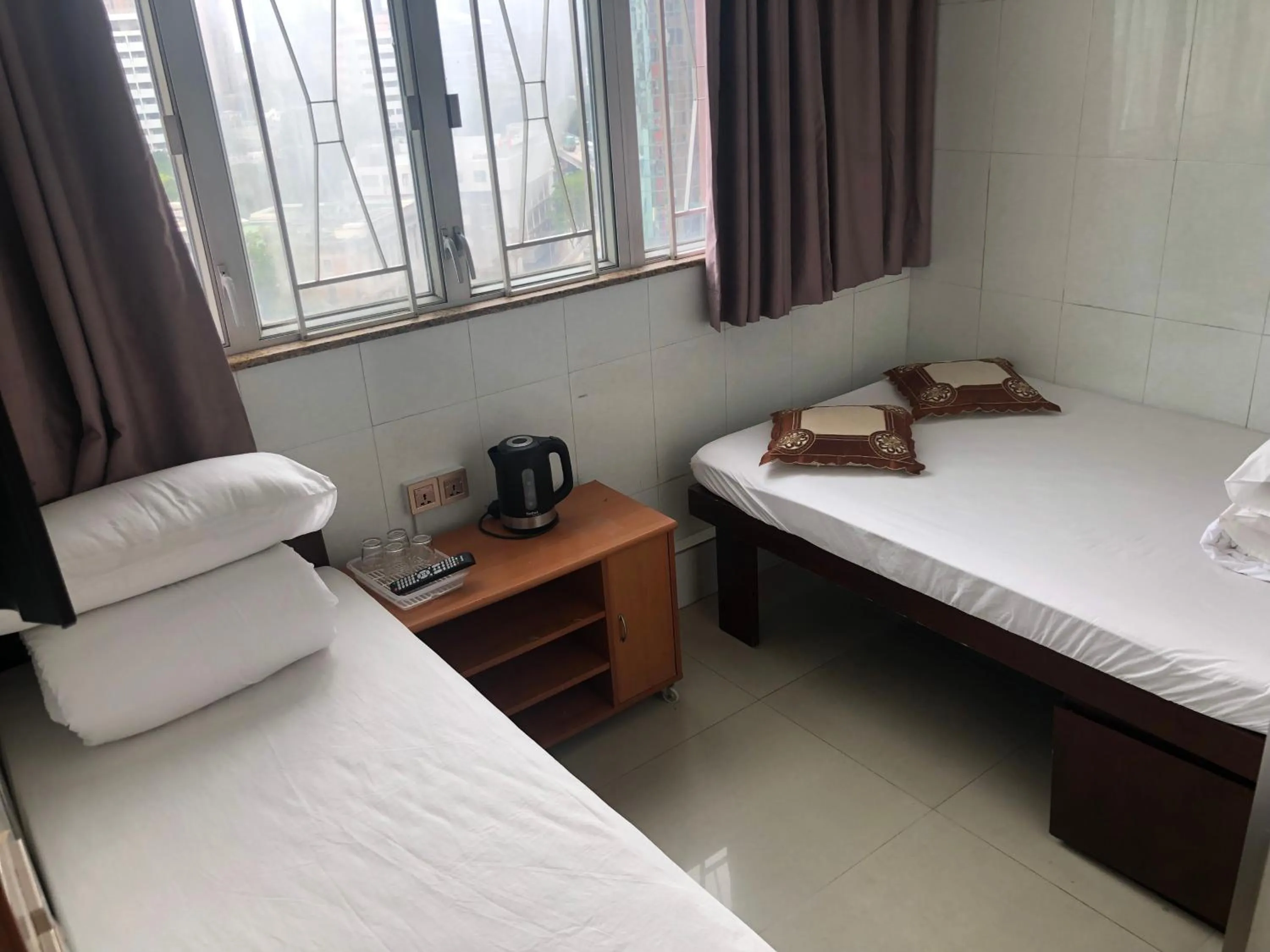 Bed in Hung Fai Guest House