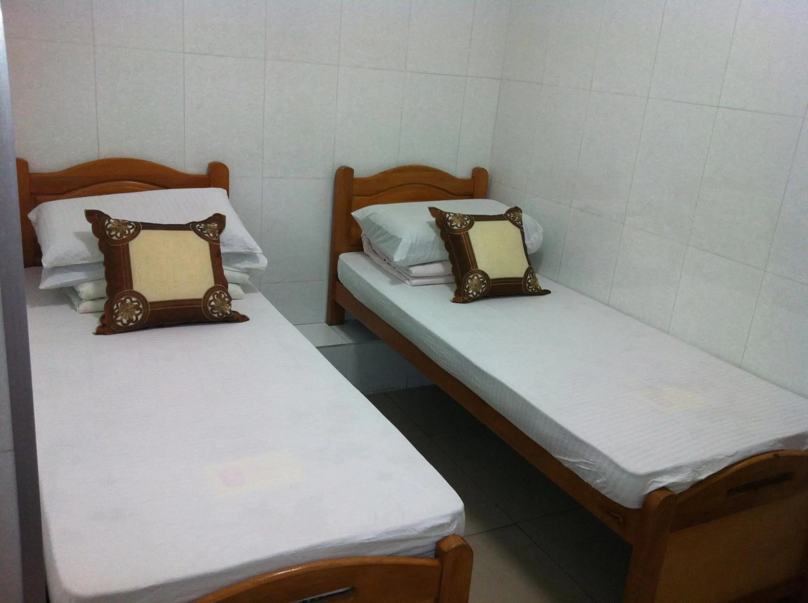 Bed in Hung Fai Guest House