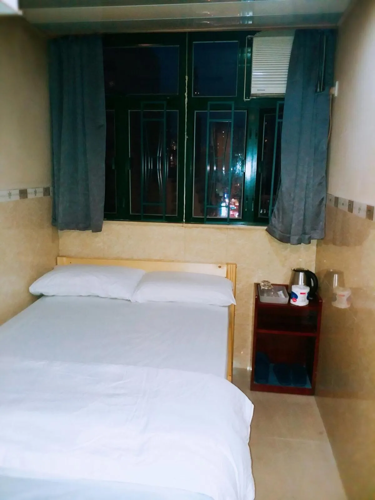 Bed in Hung Fai Guest House