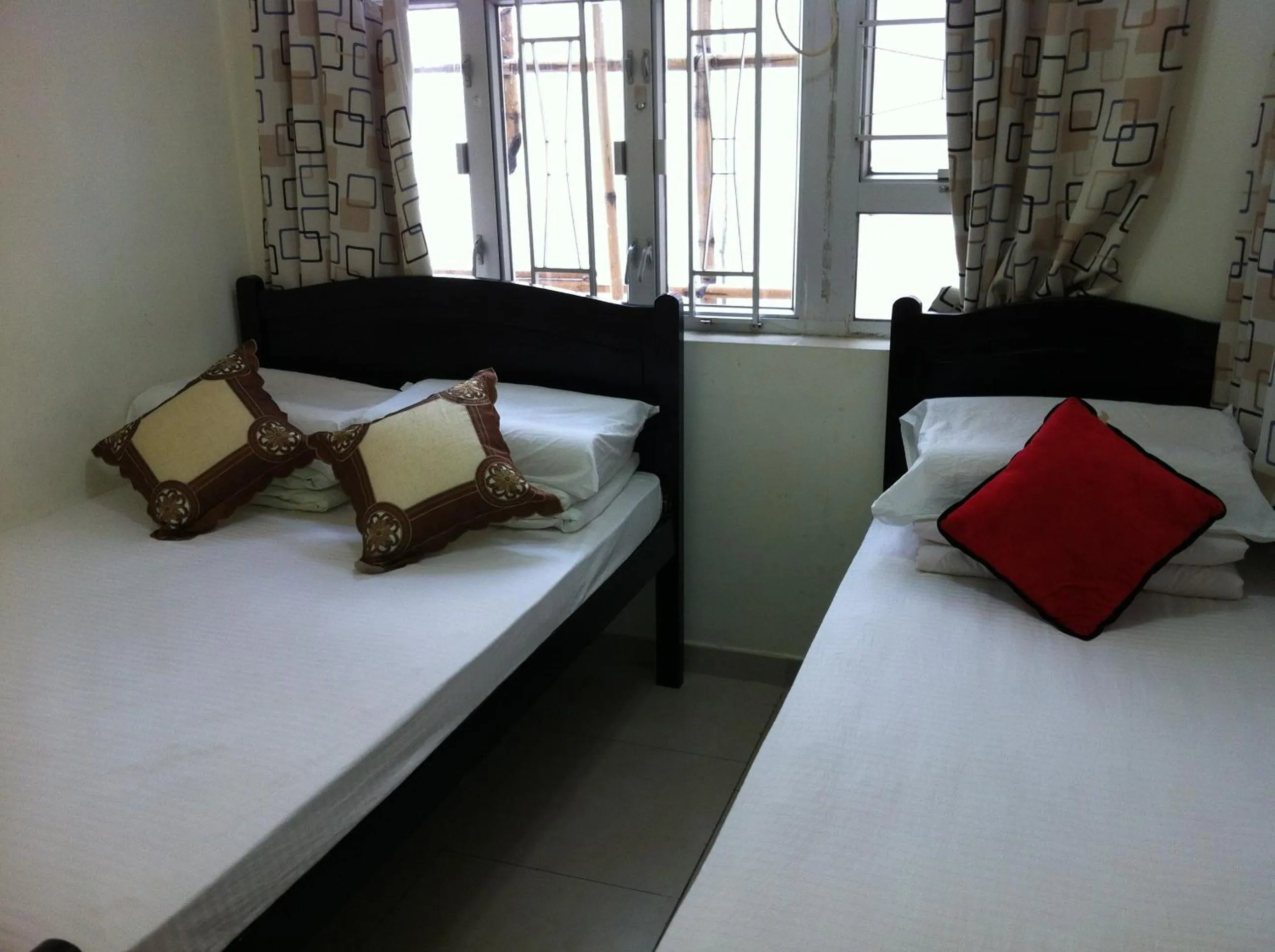 Bed in Hung Fai Guest House