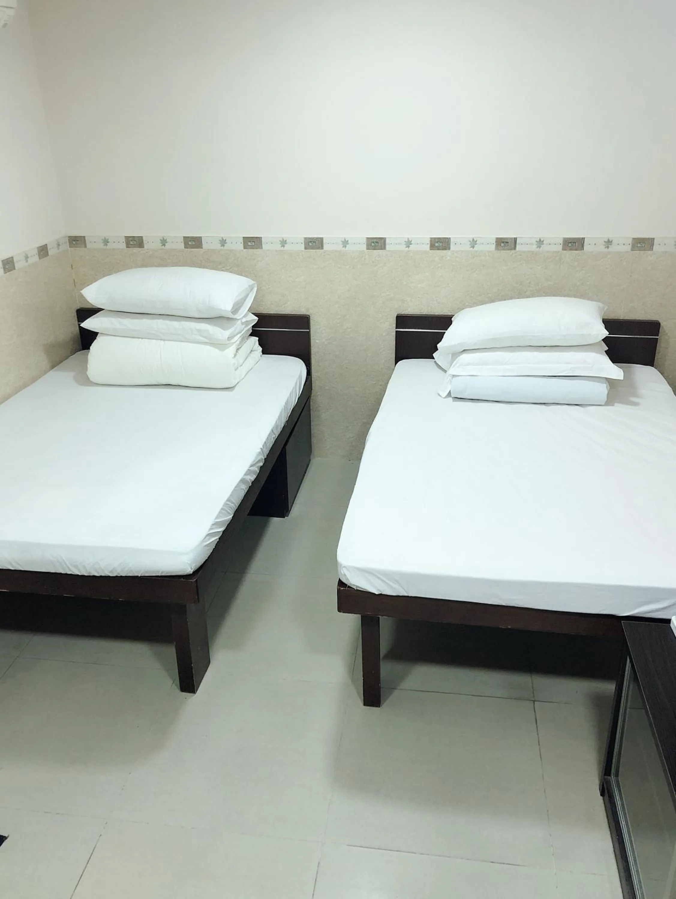 Bed in Hung Fai Guest House