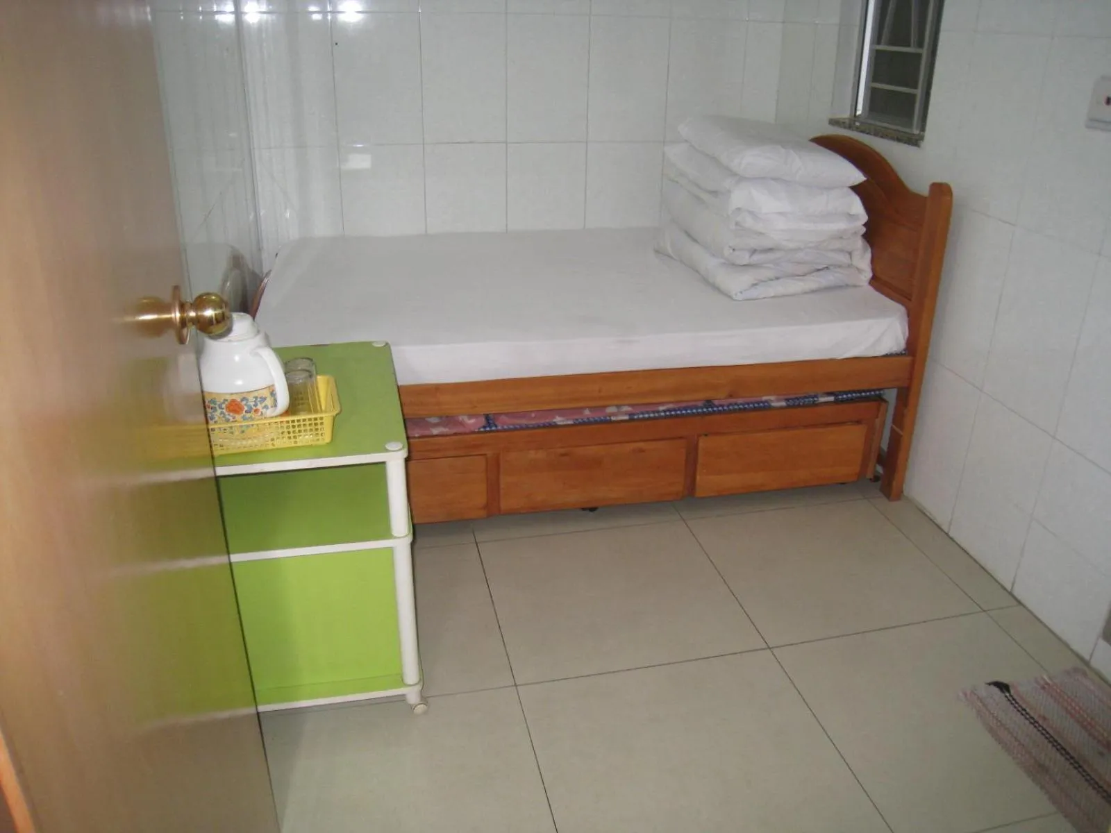 Bed in Hung Fai Guest House