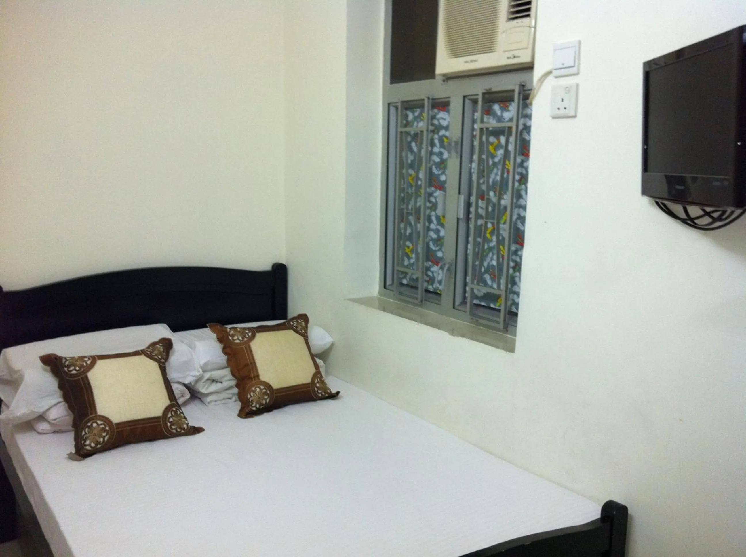 Bed in Hung Fai Guest House