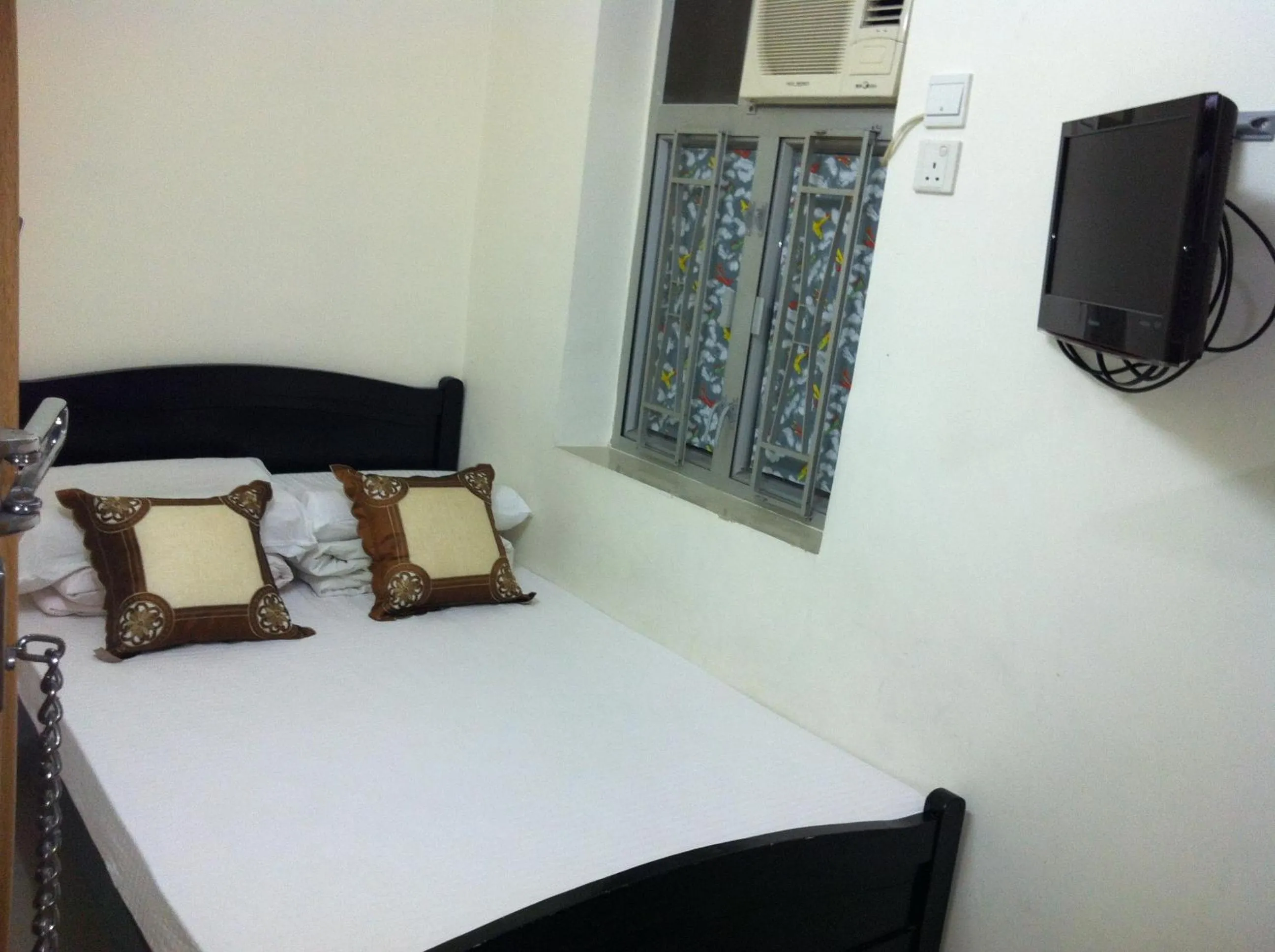 Bed in Hung Fai Guest House