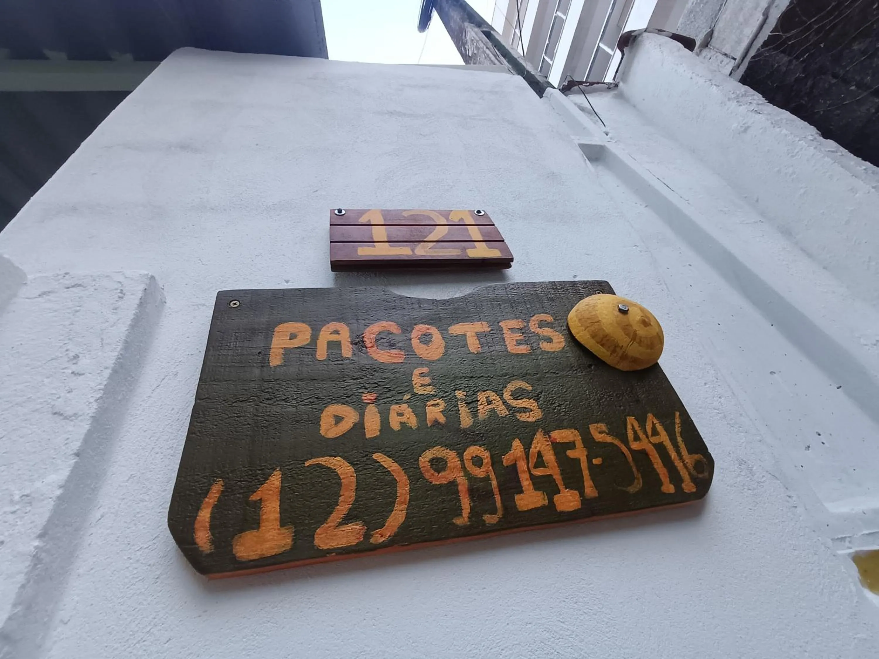 Property logo or sign in Casa na Praia da Enseada - Ubatuba