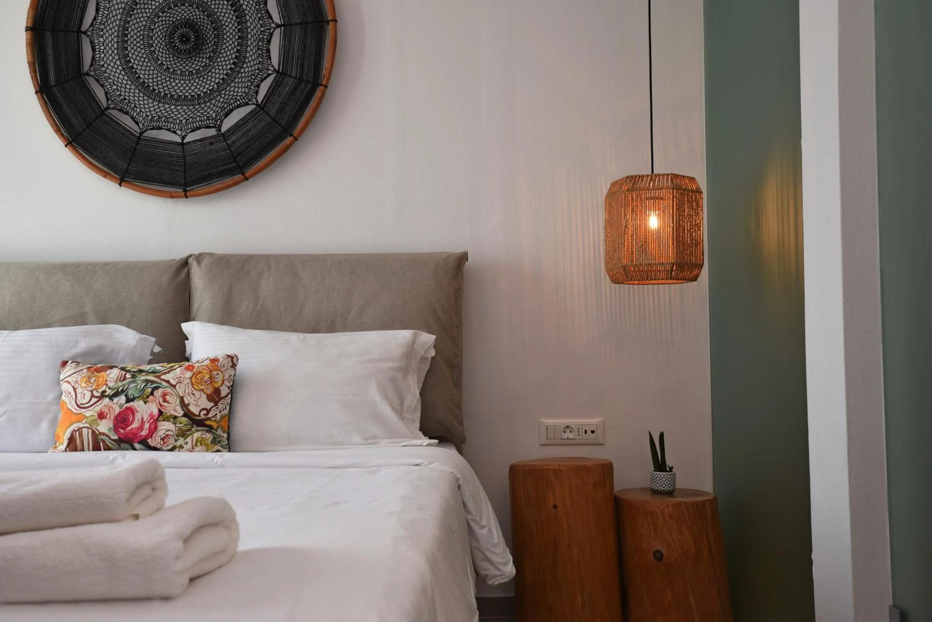 Bed in Adonis Hotel Studios & Apartments