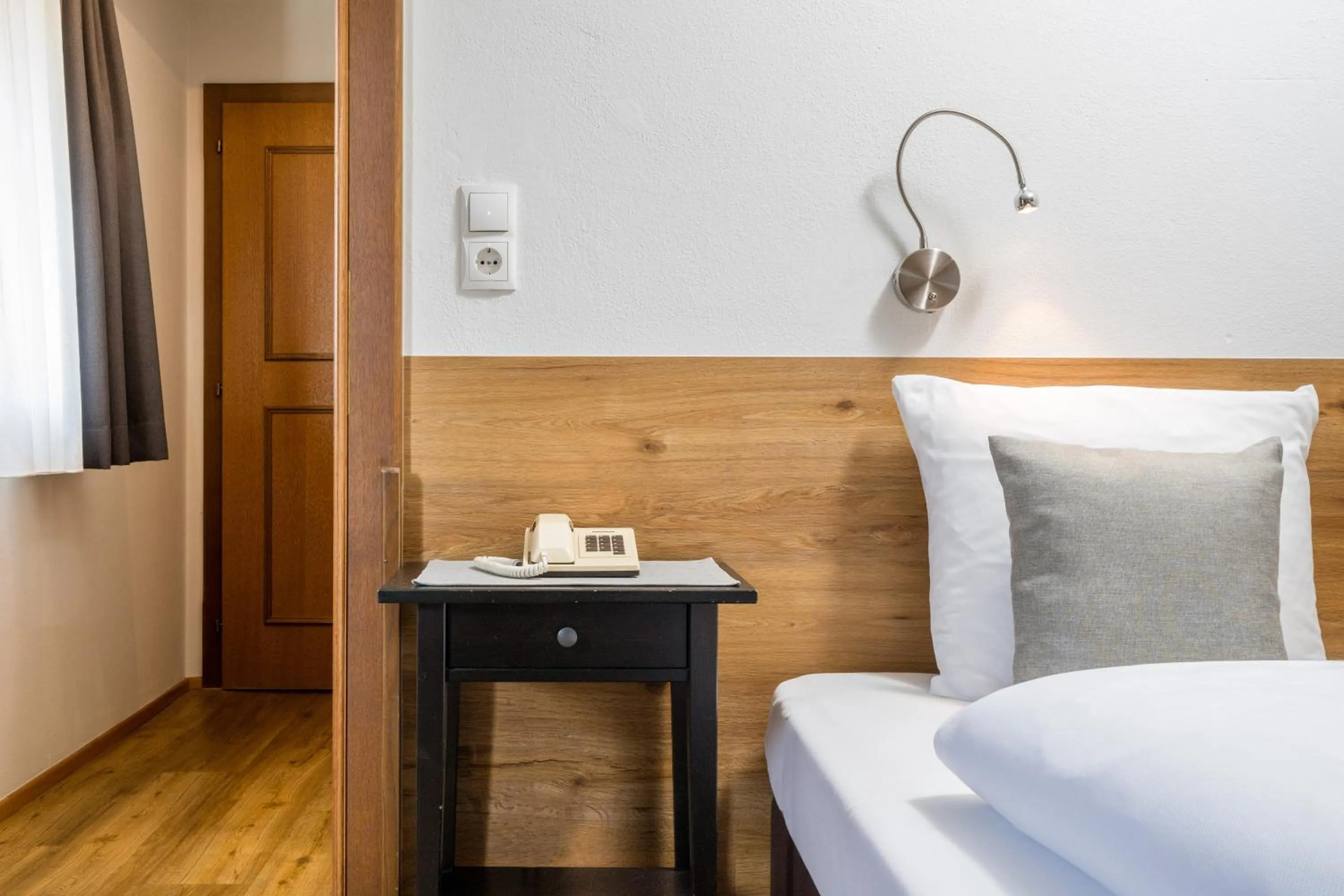 Photo of the whole room, Bed in Hotel Standlhof Zillertal