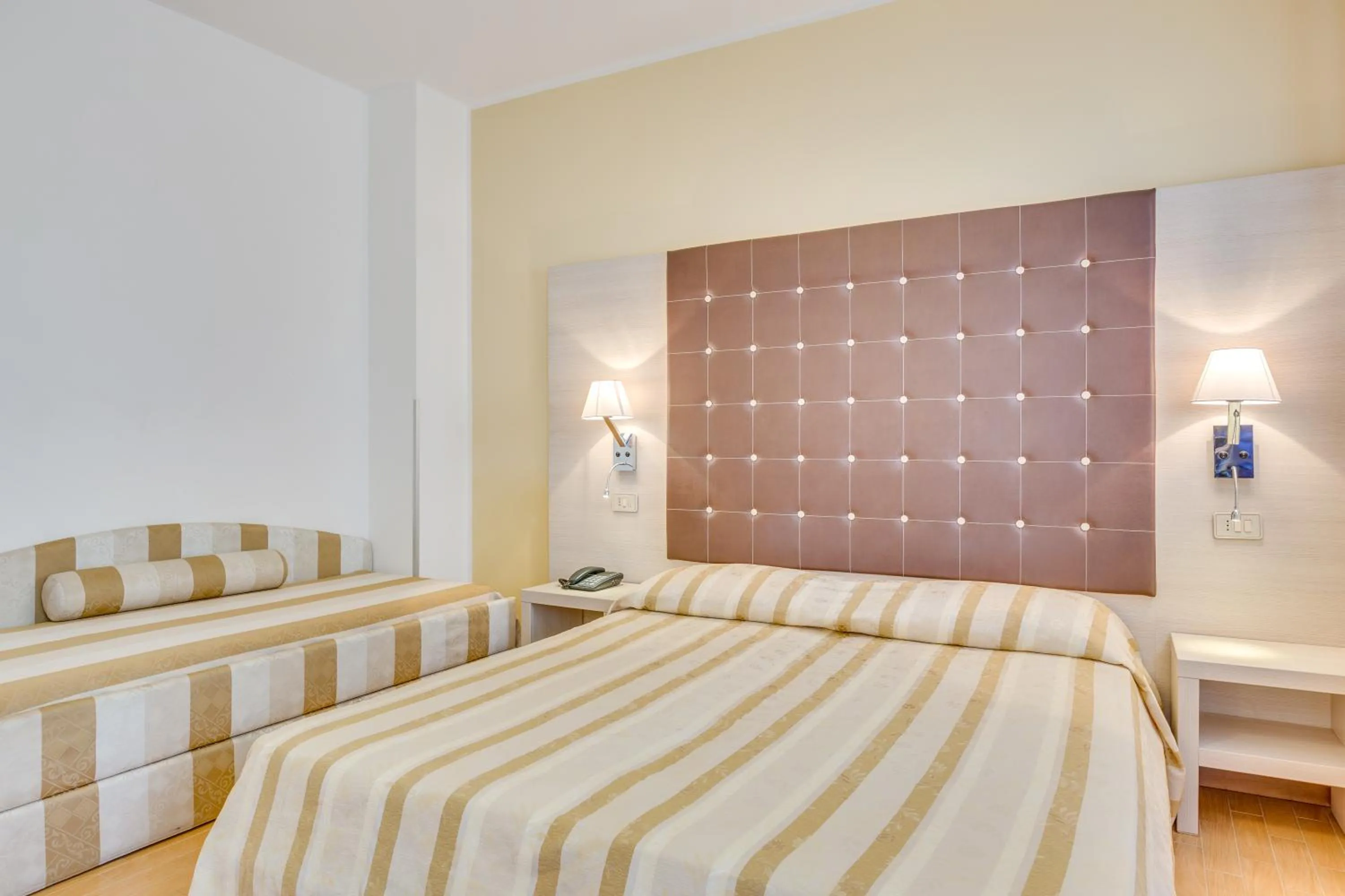 Bed in Hotel Ambassador