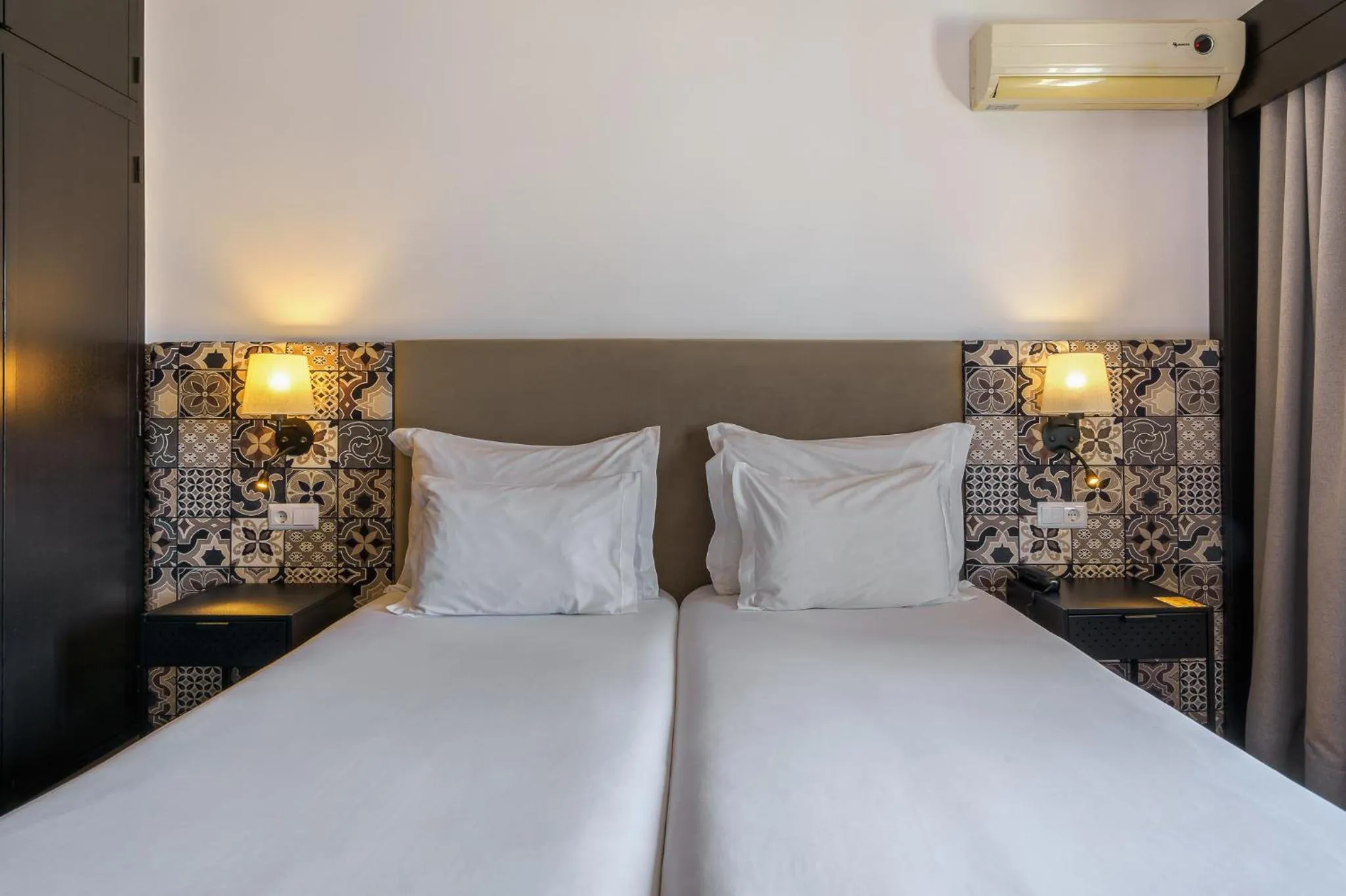 Bed in AquaHotel by Aqualeisure