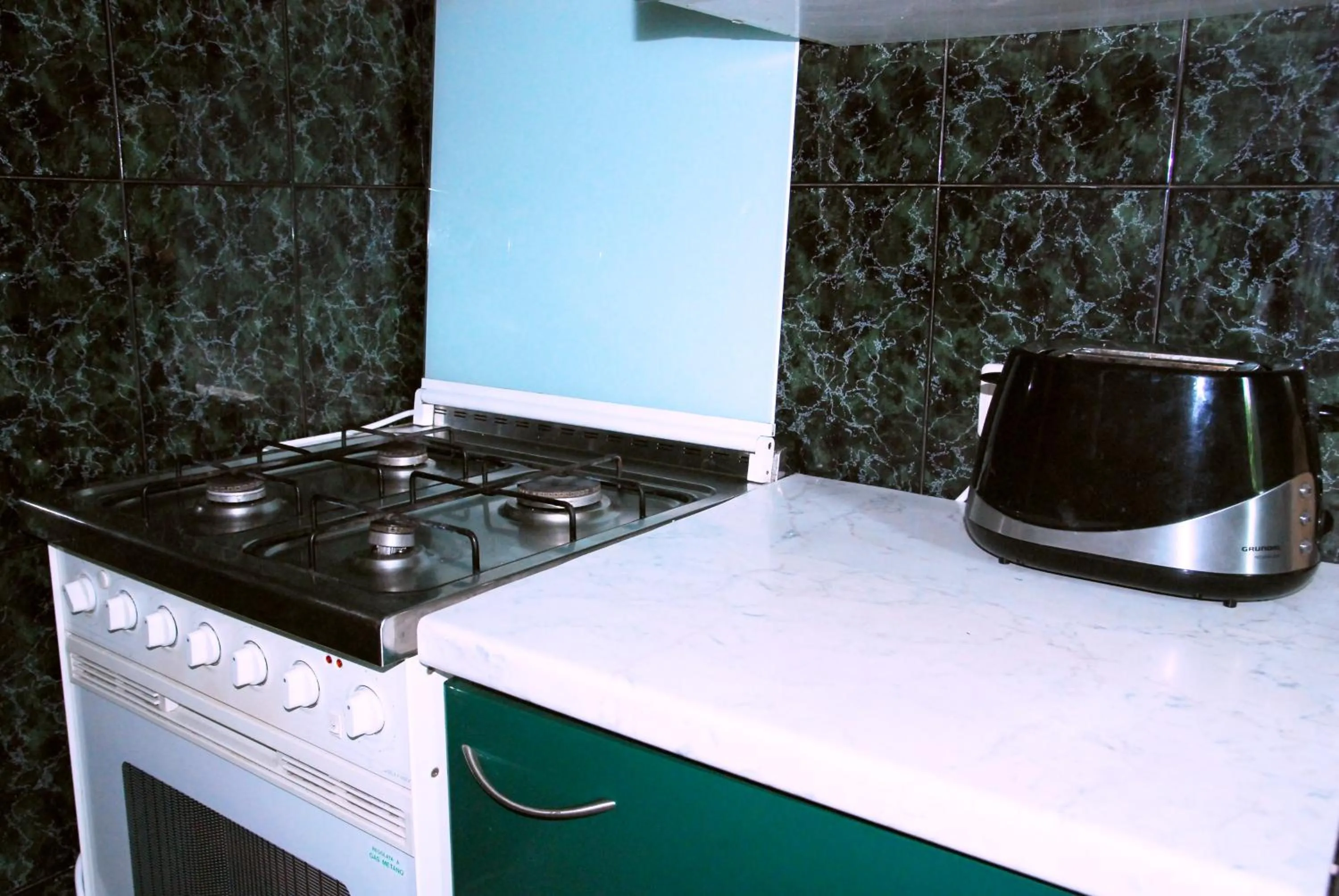 Communal kitchen in Maison Blanche Kyiv city center