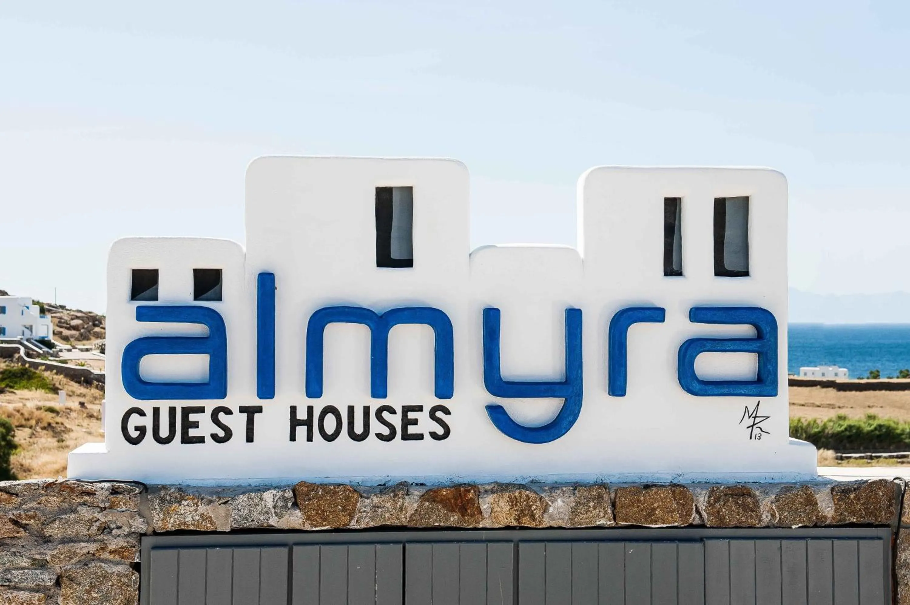 Property logo or sign in Almyra Guest Houses