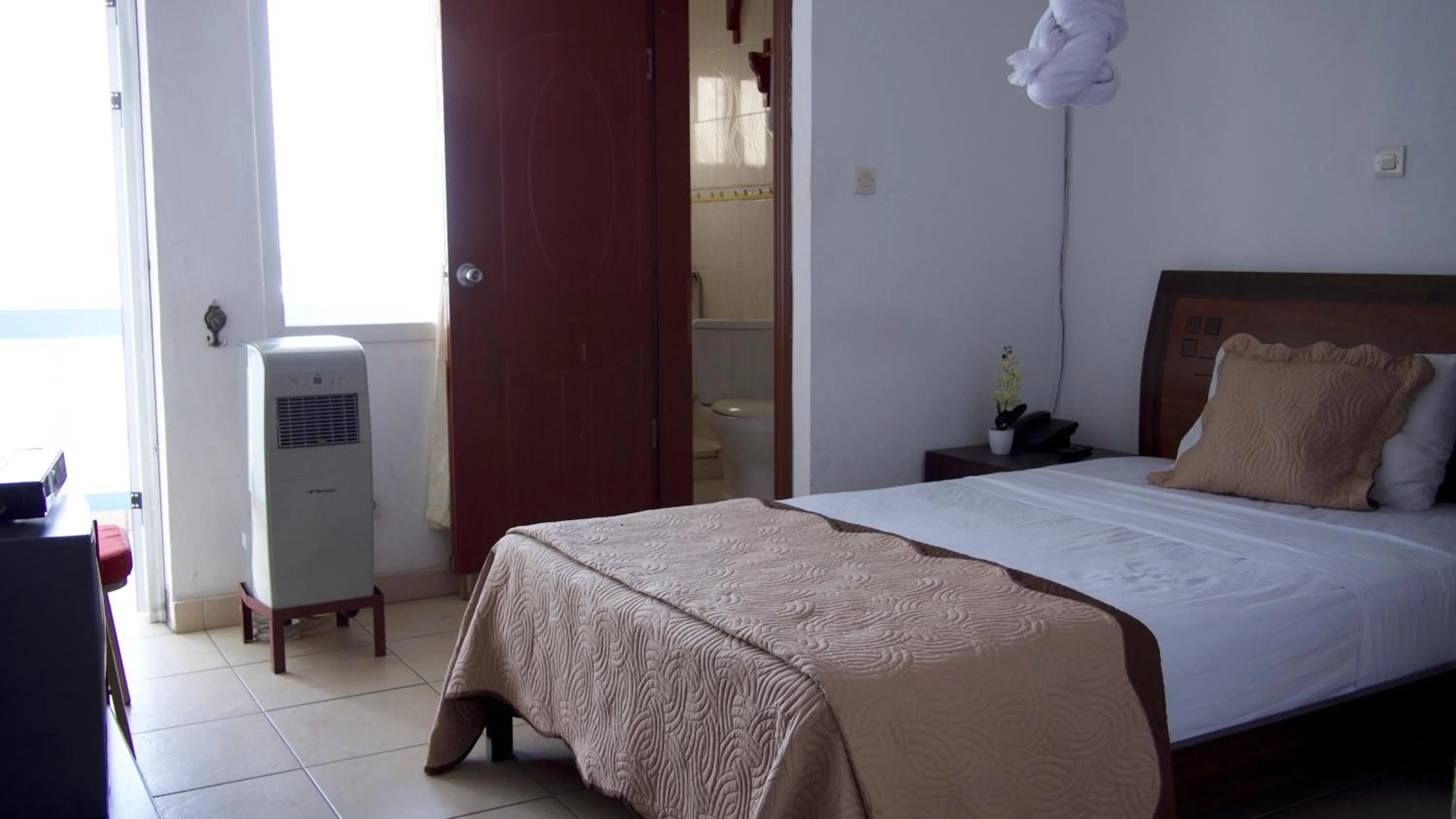 Bed in Océanis Hotel