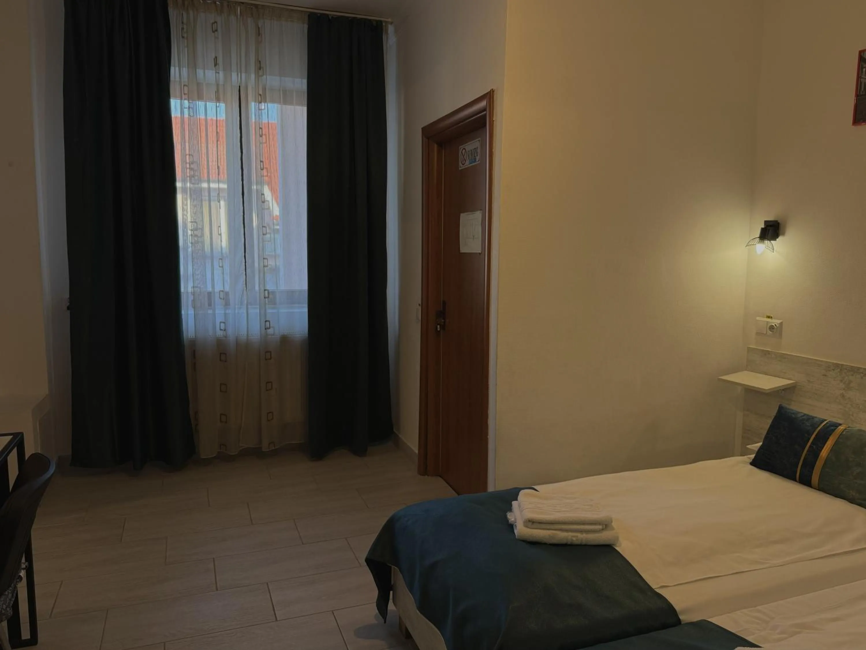 towels, Bed in Pension Recidency