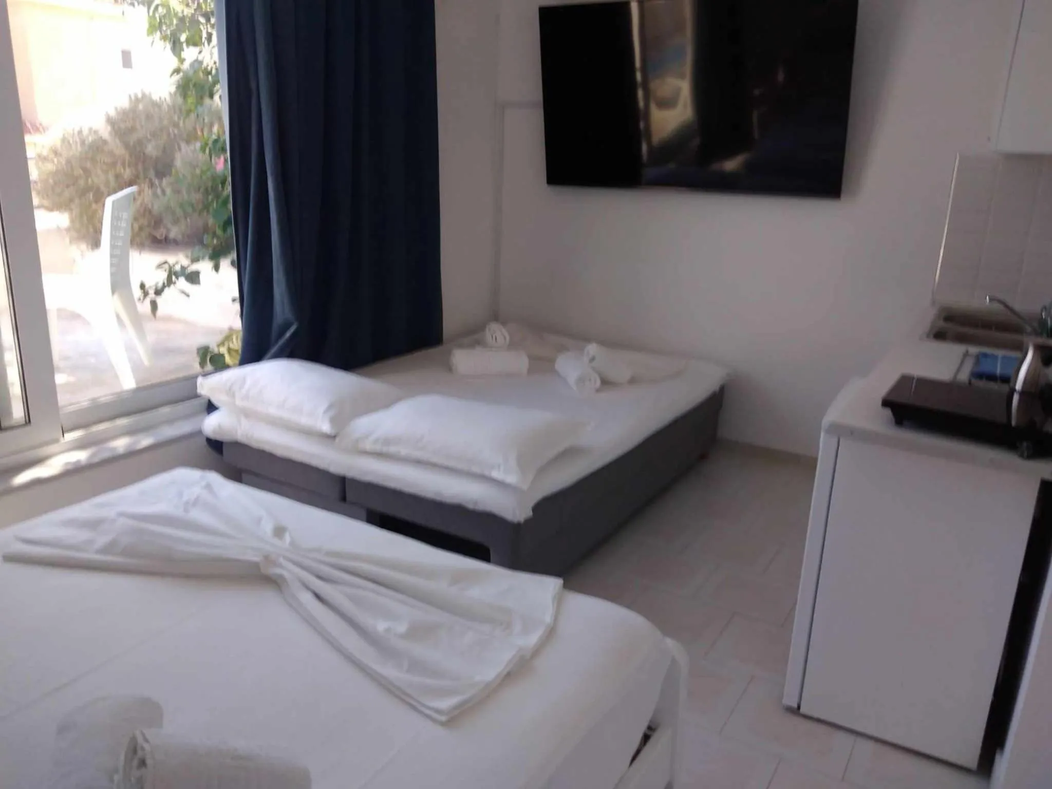 Photo of the whole room, Bed in Blue Dolphin Studios and Apartment