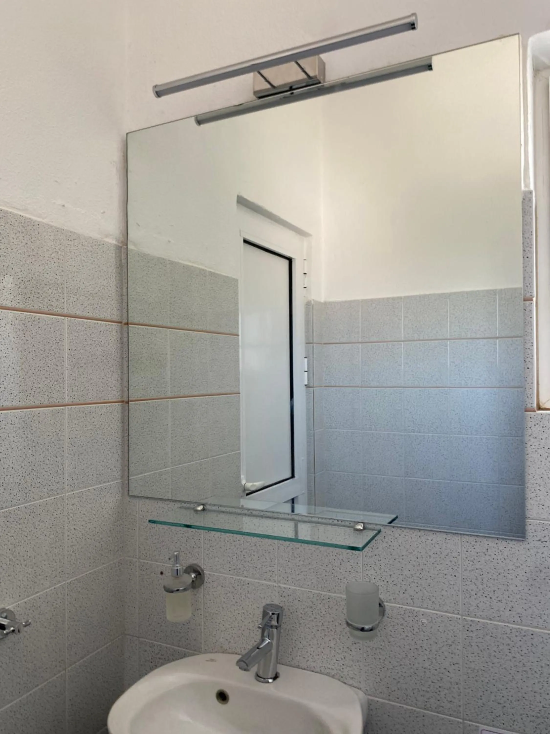 Toilet in Blue Dolphin Studios and Apartment