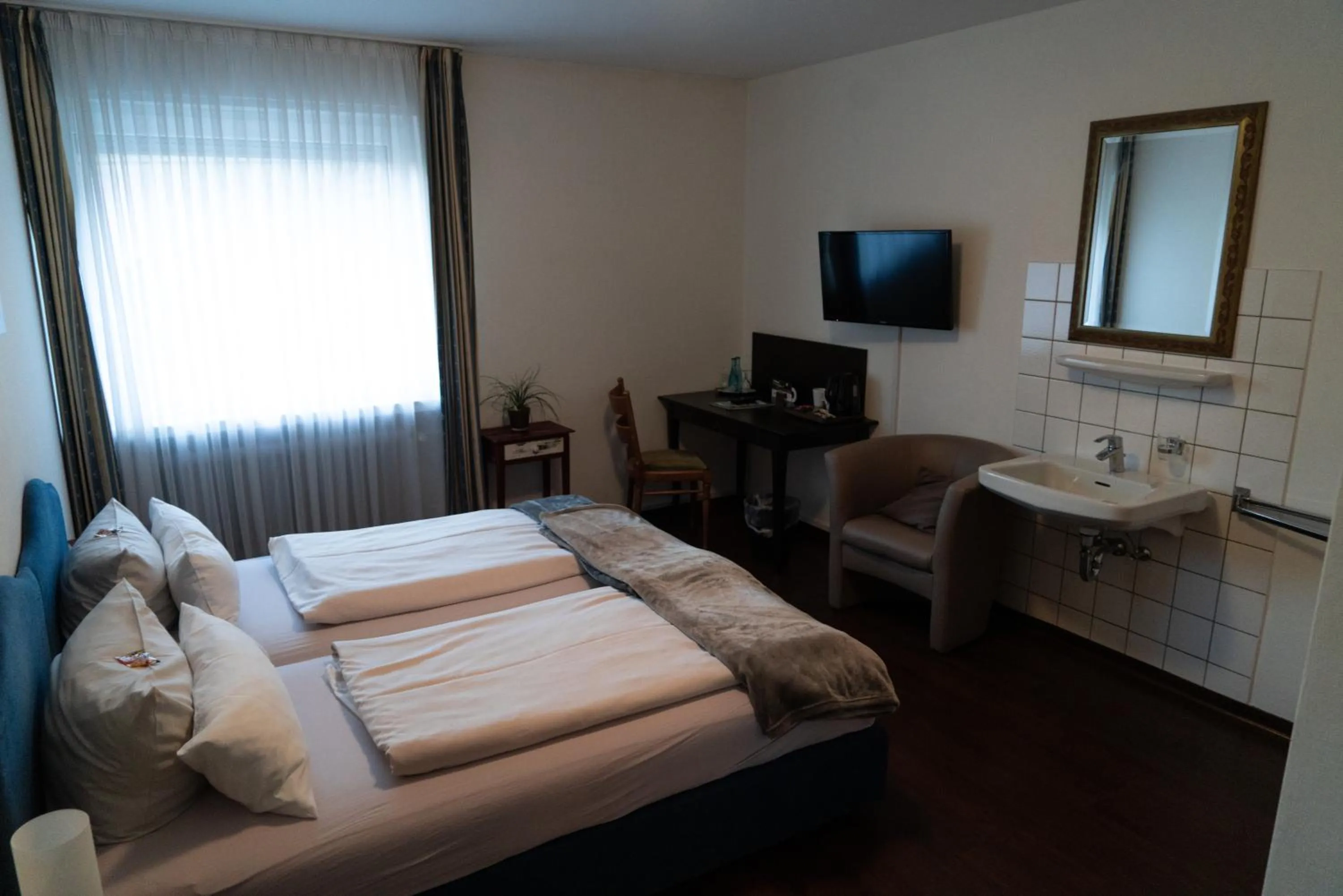 Photo of the whole room, Bed in Hotel-Restaurant Kolpinghaus