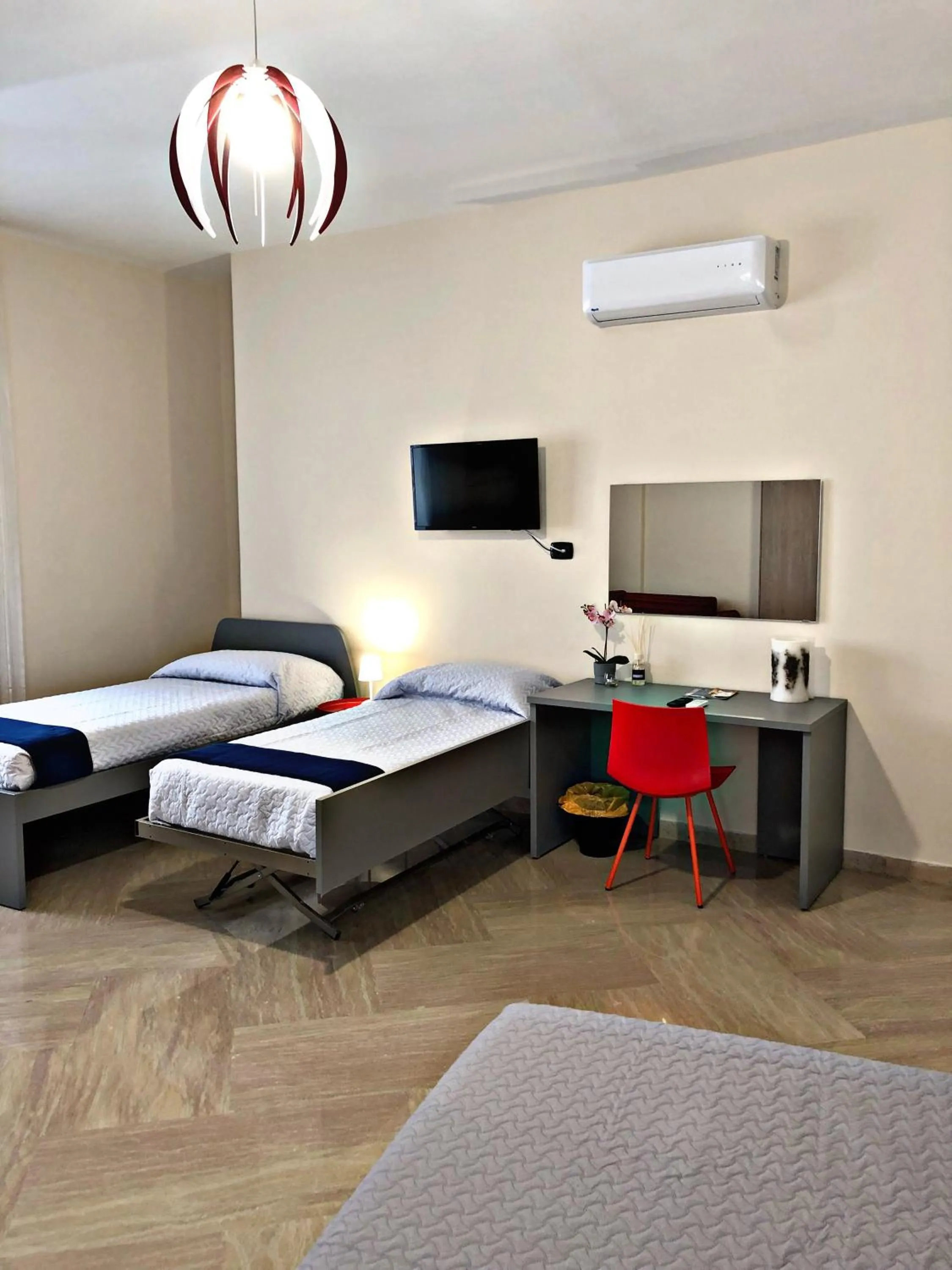 Bed in Napoli City Inn