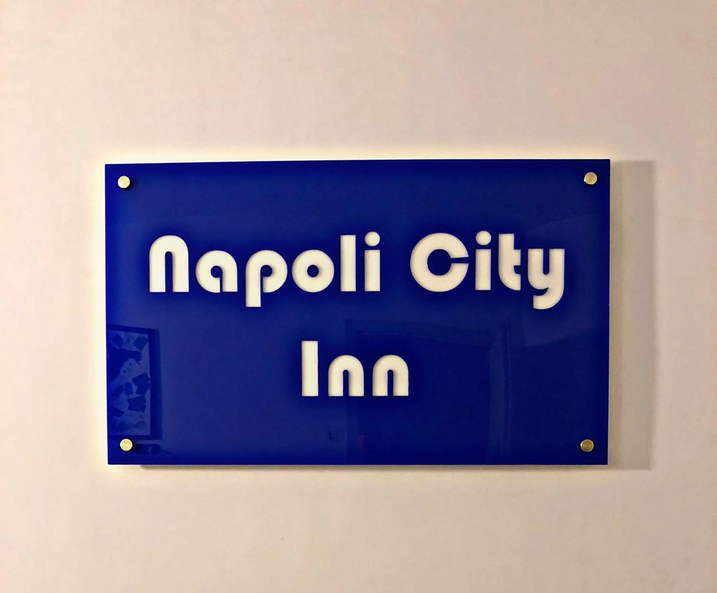 Property logo or sign in Napoli City Inn