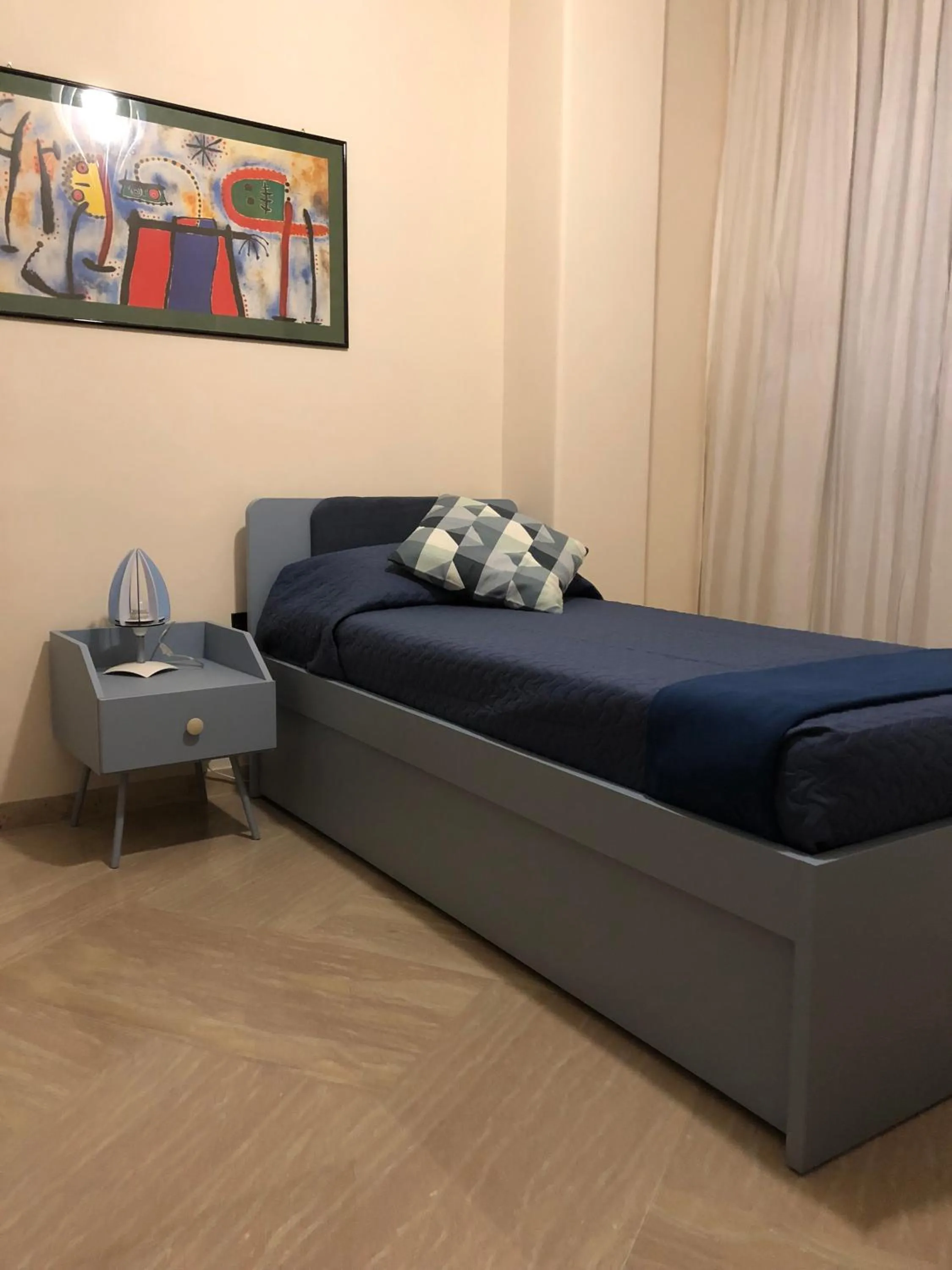 Bed in Napoli City Inn