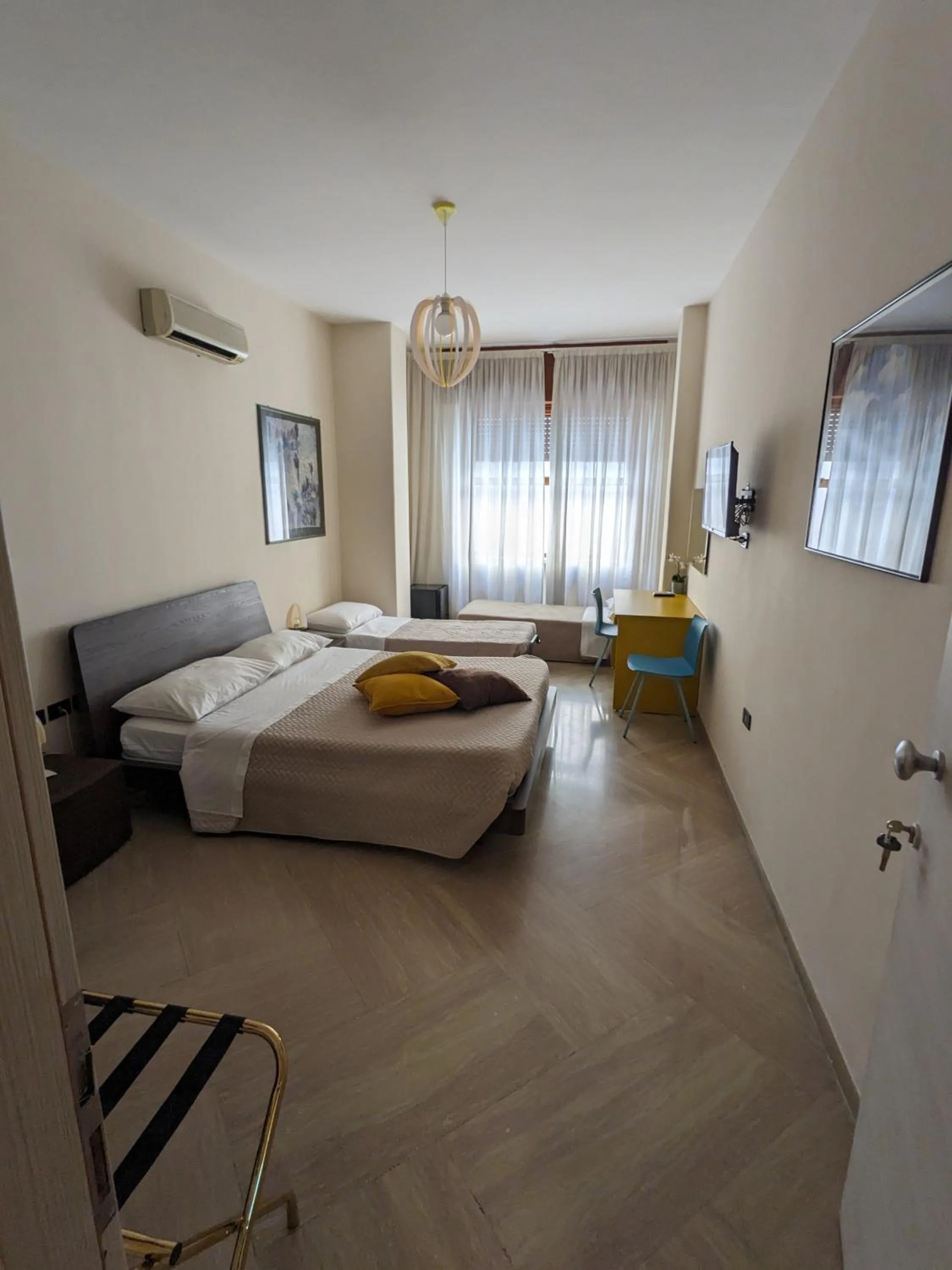 Bed in Napoli City Inn