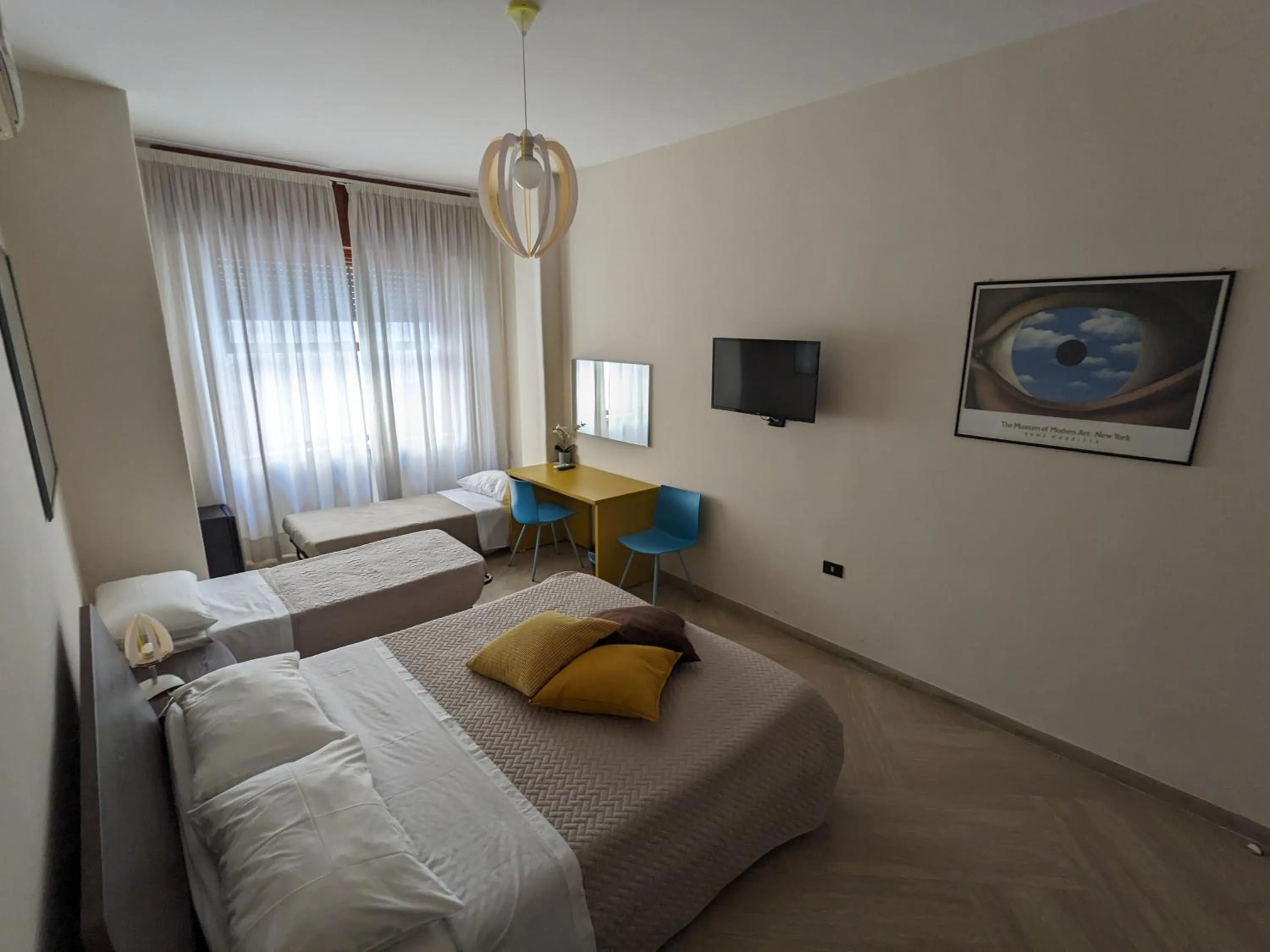 Bed in Napoli City Inn