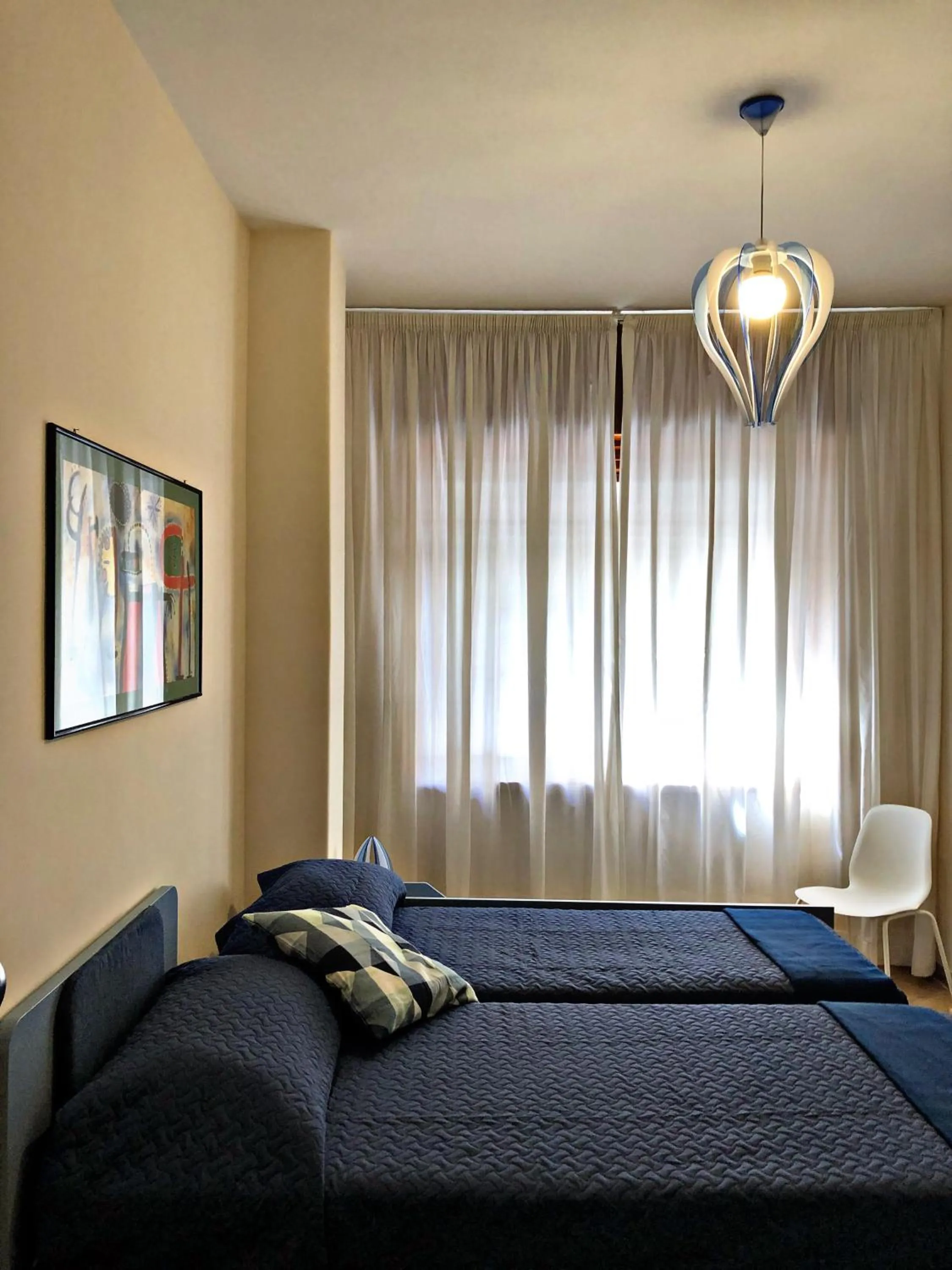 Bed in Napoli City Inn