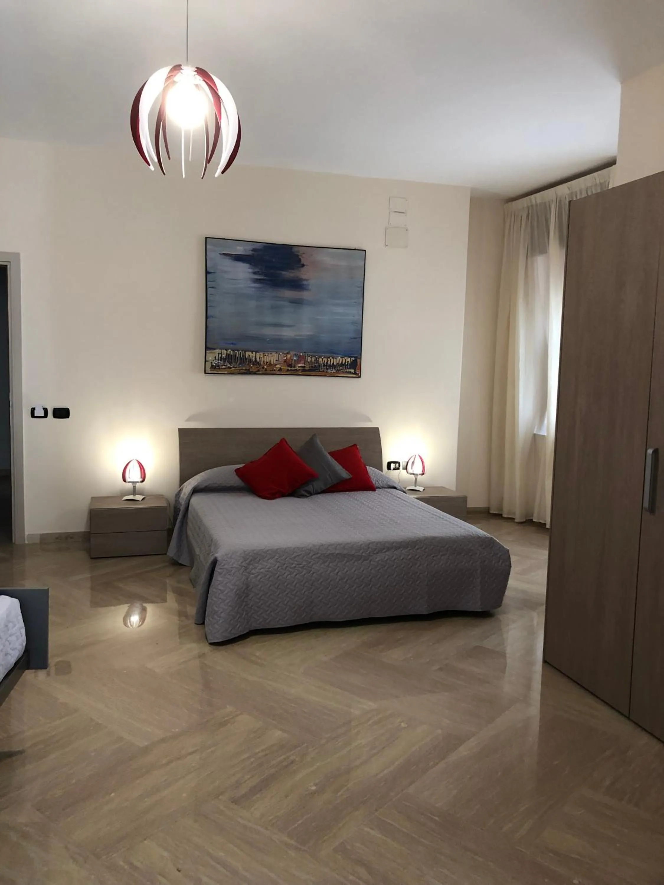 Bed in Napoli City Inn