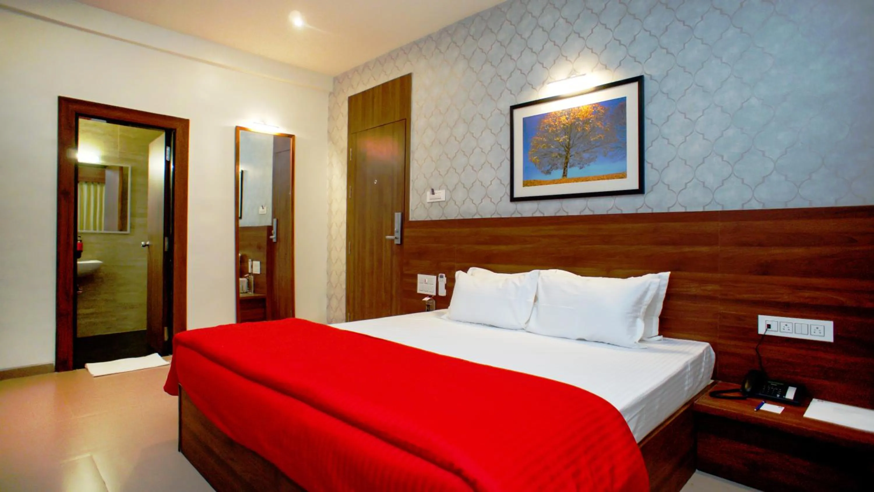 Bedroom, Bed in Mastiff Hotel Chinchwad by OTHPL