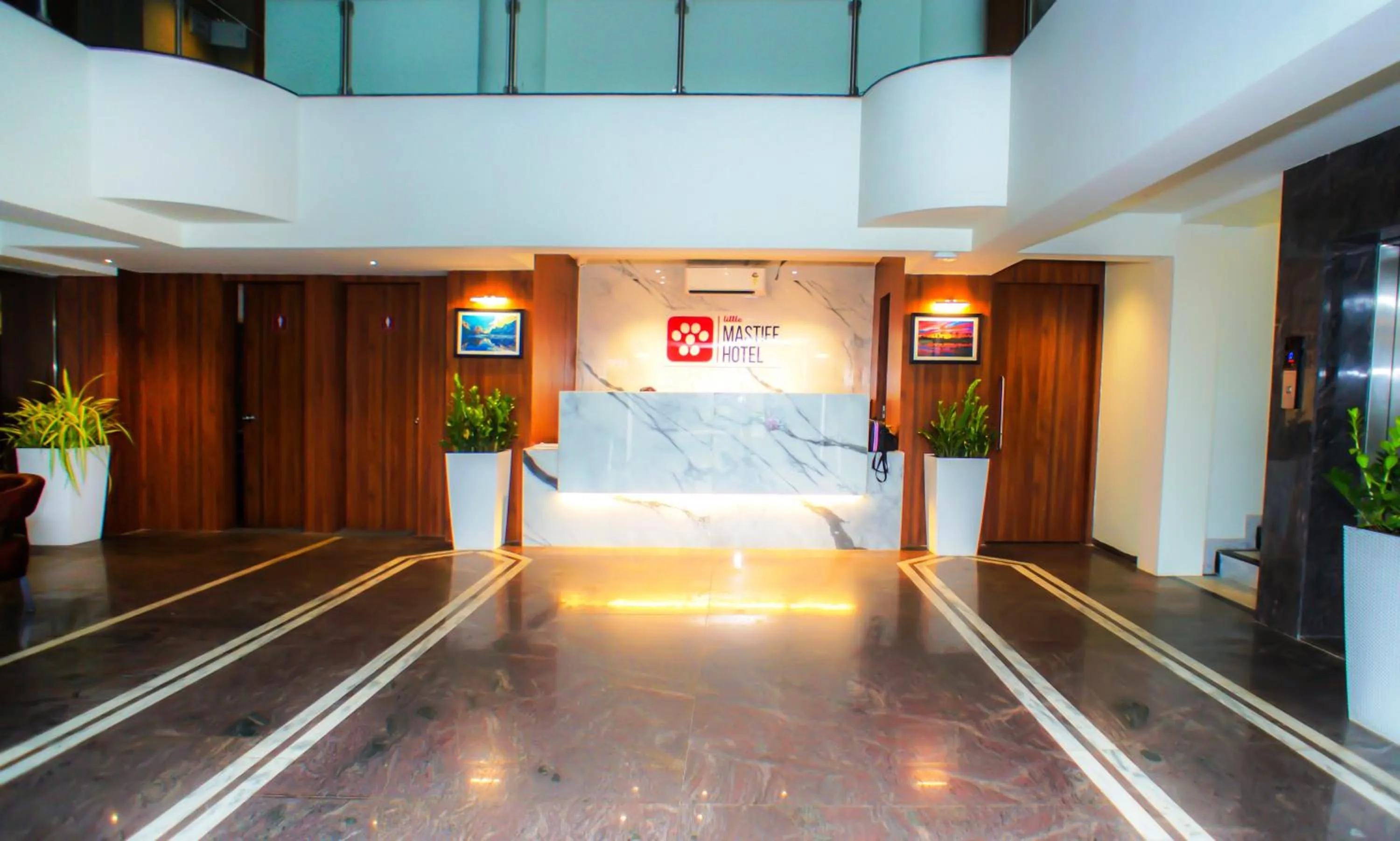 Lobby or reception in Mastiff Hotel Chinchwad by OTHPL