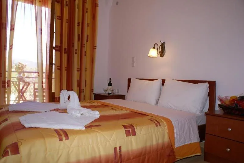 Bed in Agnanti Hotel